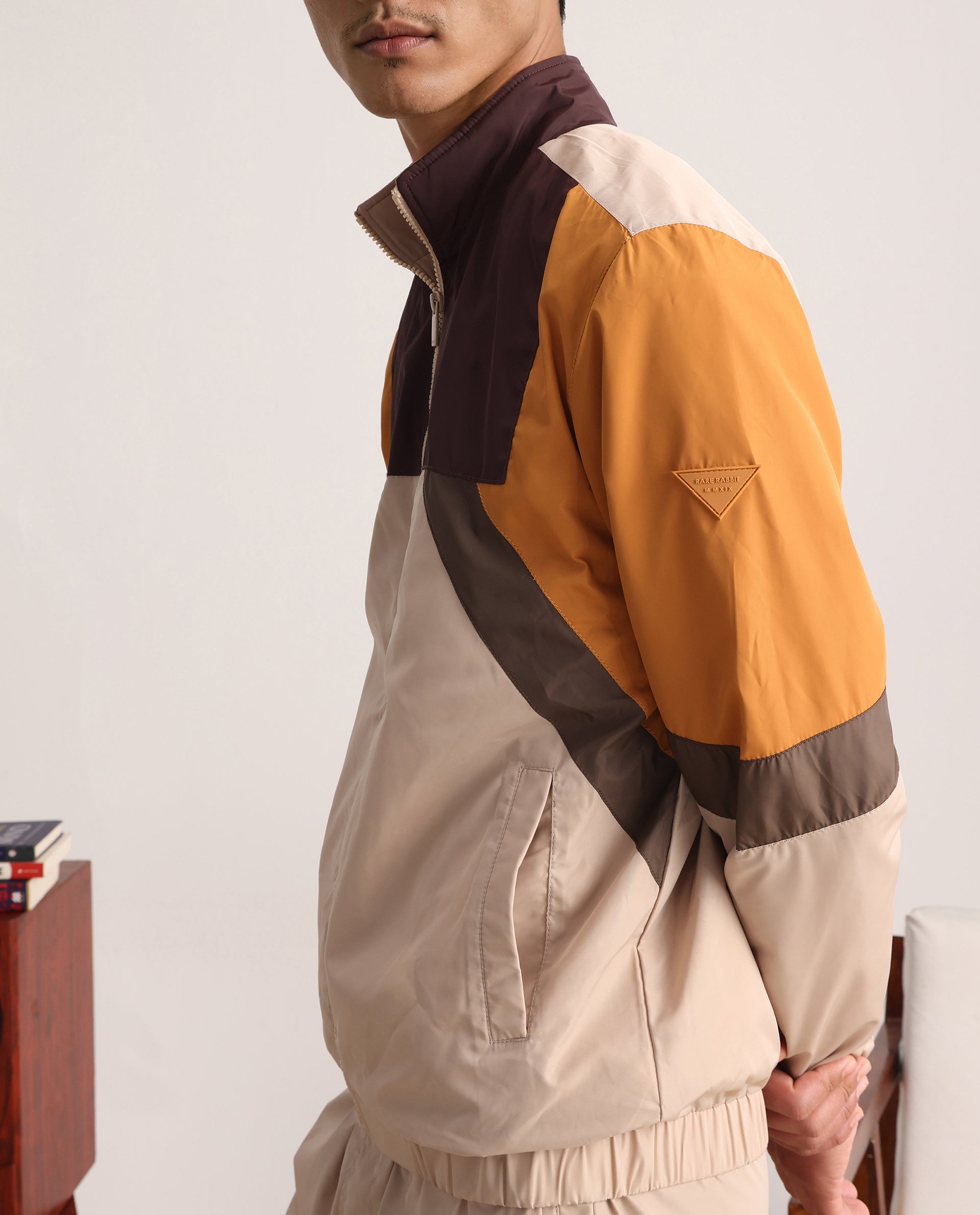 Rare Rabbit Men Malo Beige Polyester Fabric Full Sleeve High Neck Collar Zipper Closure Cut and Sew Jacket