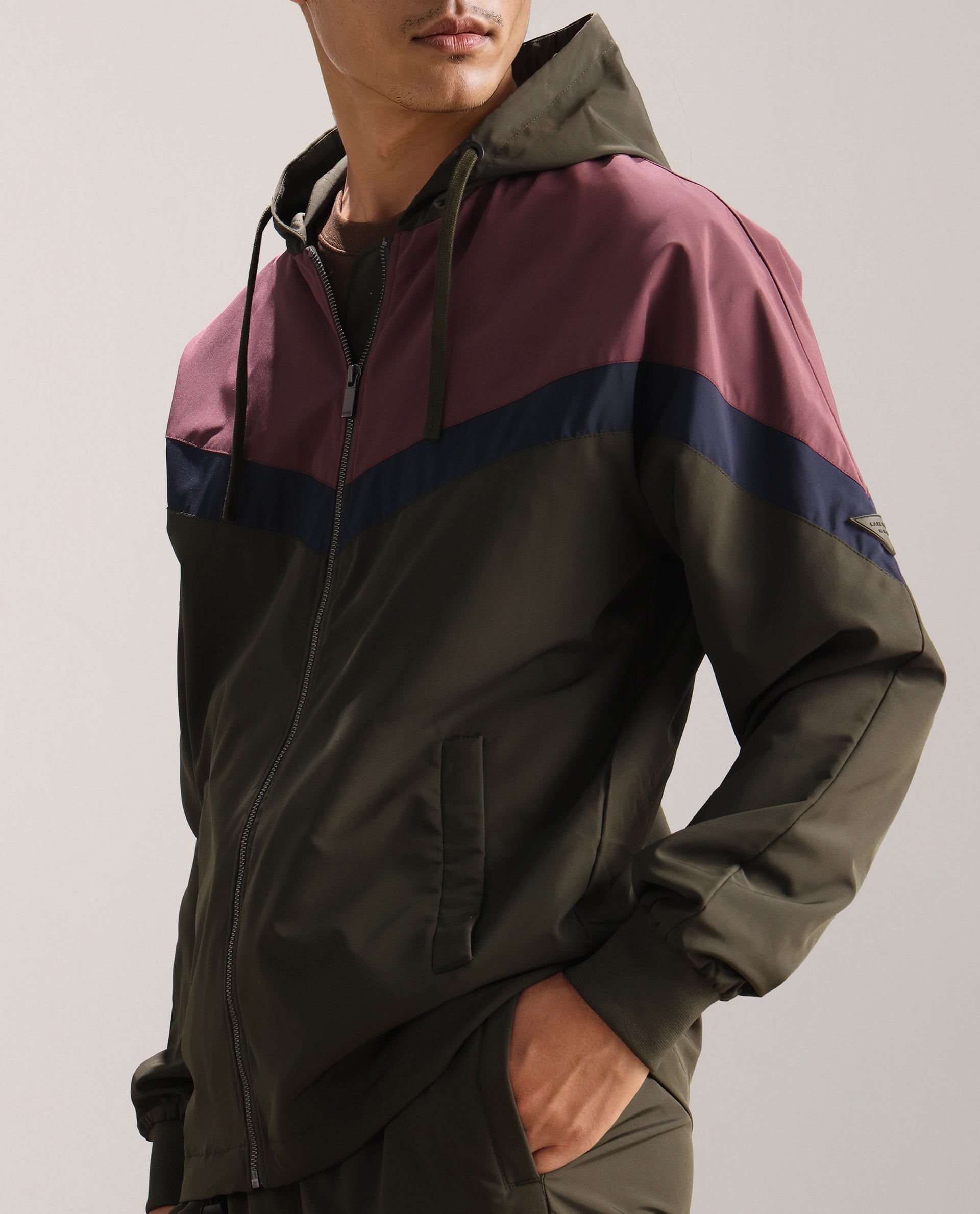 Rare Rabbit Men Waber Olive Polyester Fabric Full Sleeve Hooded Zipper Closure Cut and Sew Jacket