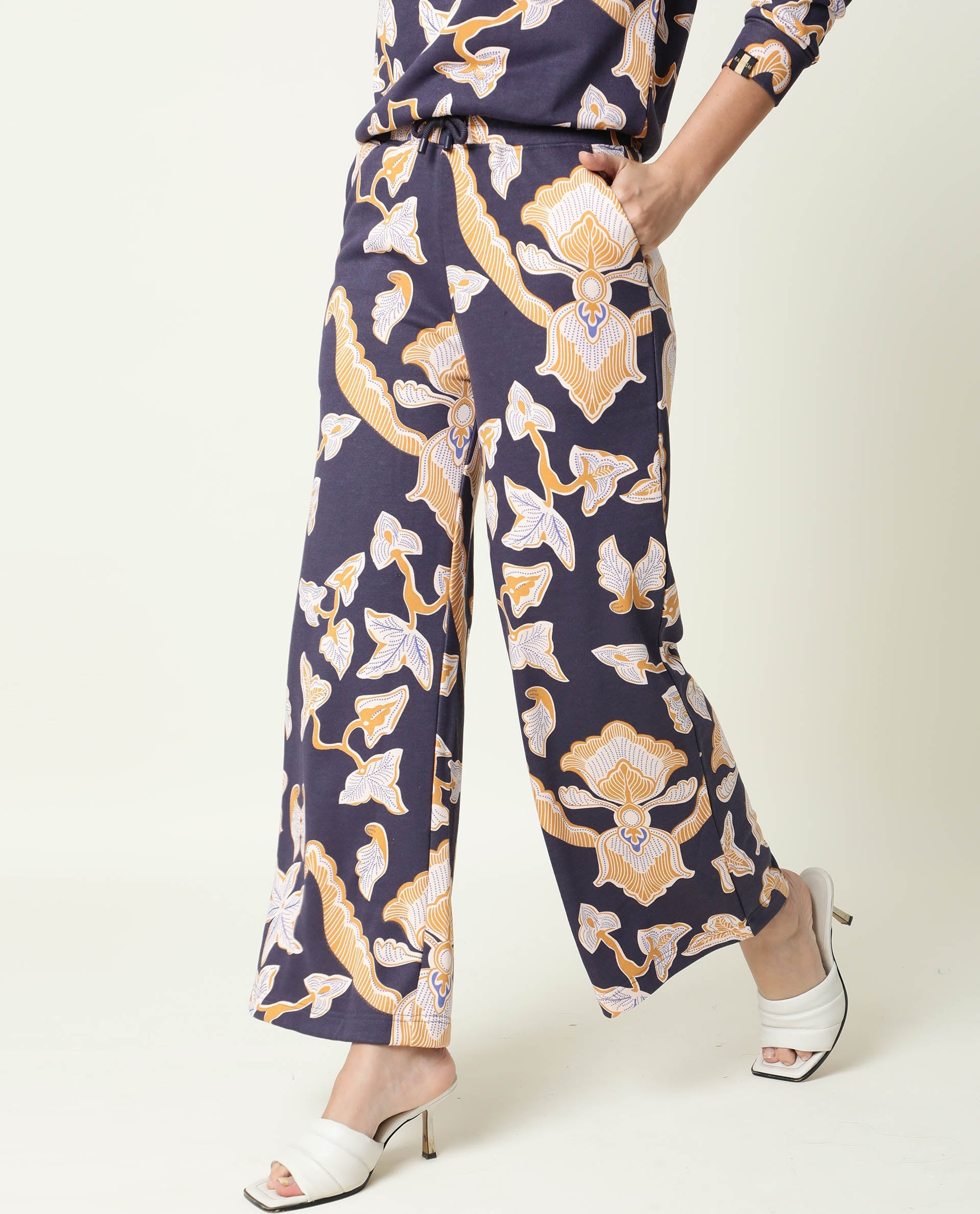 Rareism Women Bogota Navy Cotton Fabric Relaxed Fit Abstract Print Mid Rise Ankle Length Track Pant