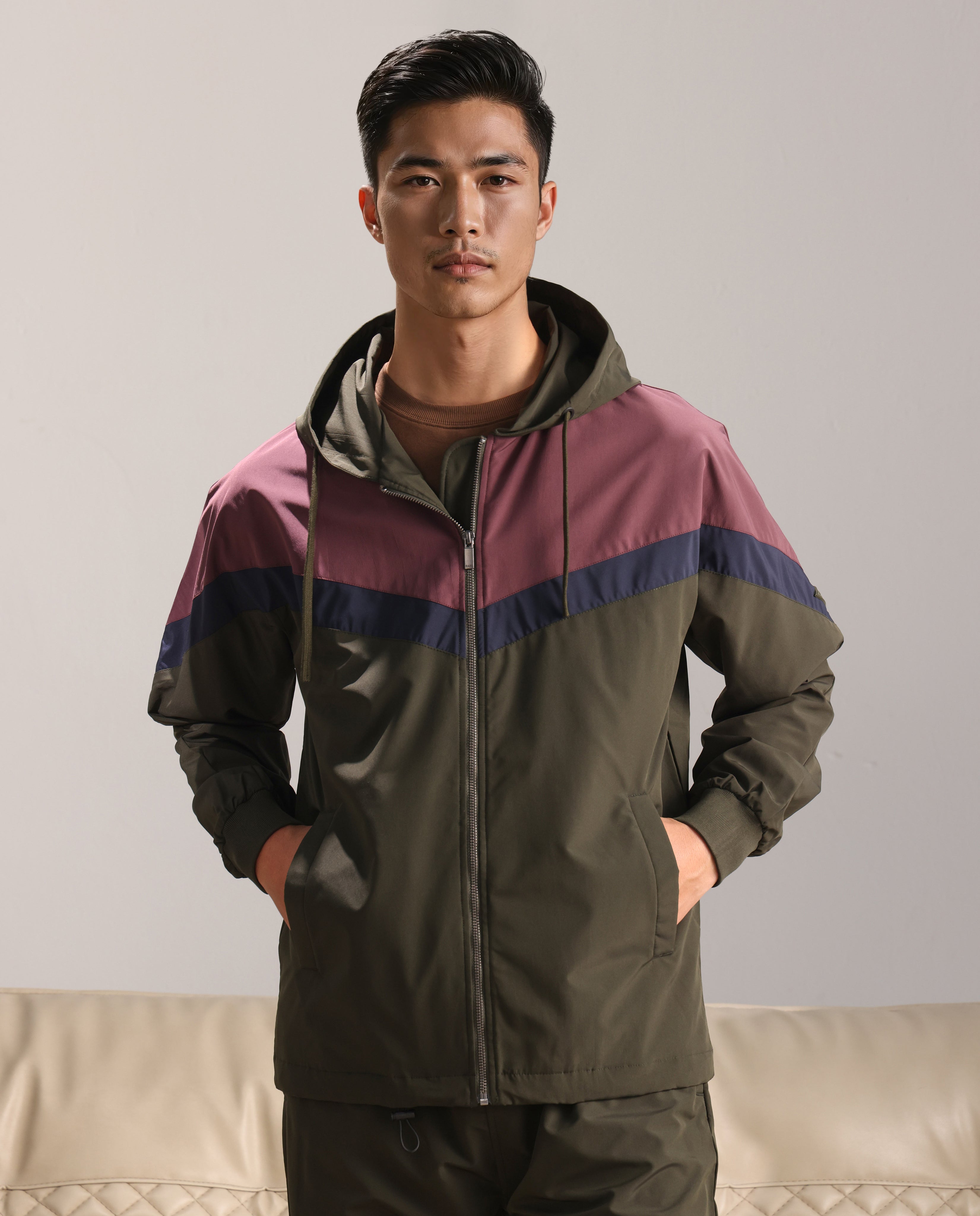 Rare Rabbit Men Waber Olive Polyester Fabric Full Sleeve Hooded Zipper Closure Cut and Sew Jacket