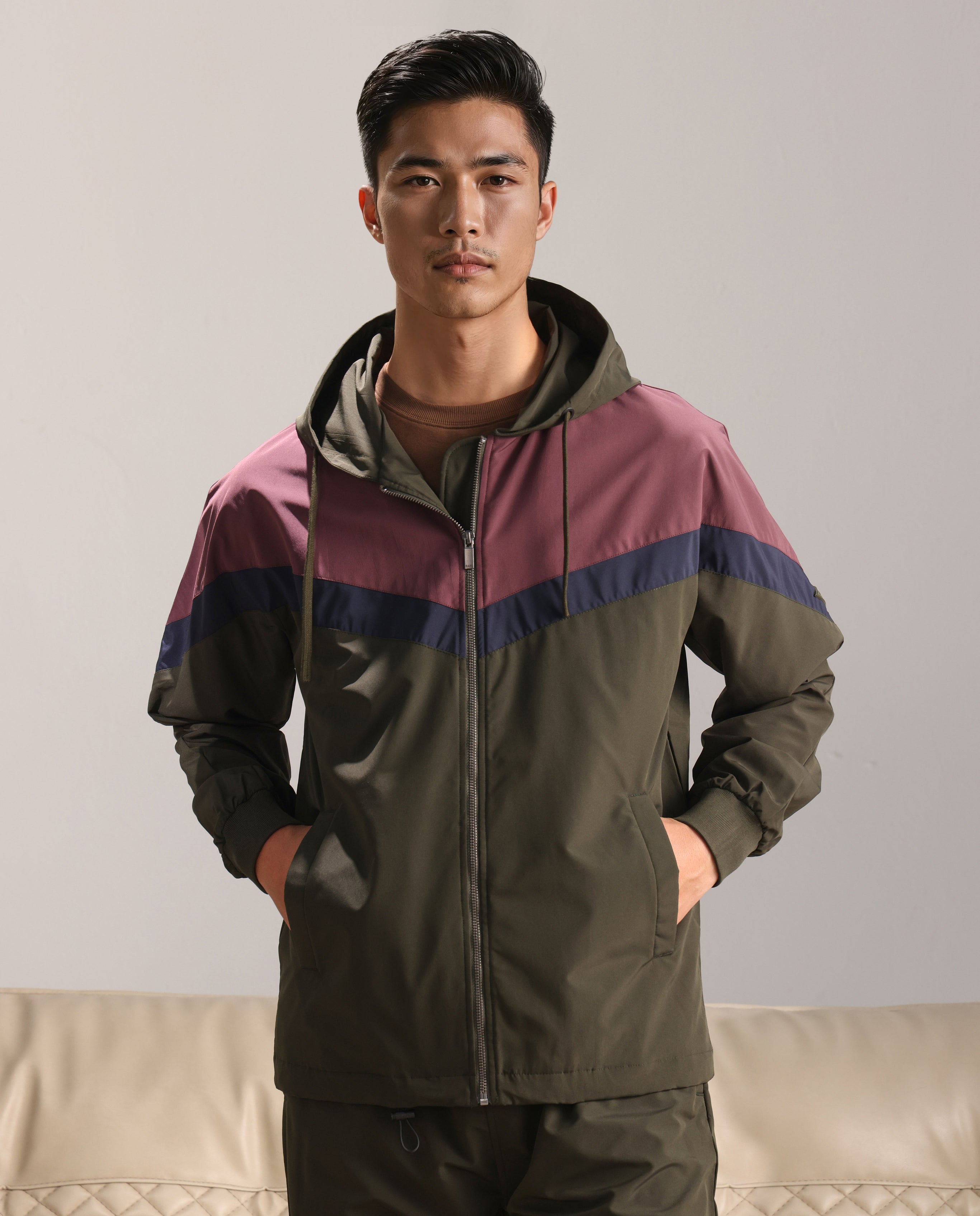 Rare Rabbit Men Waber Olive Polyester Fabric Full Sleeve Hooded Zipper Closure Cut and Sew Jacket