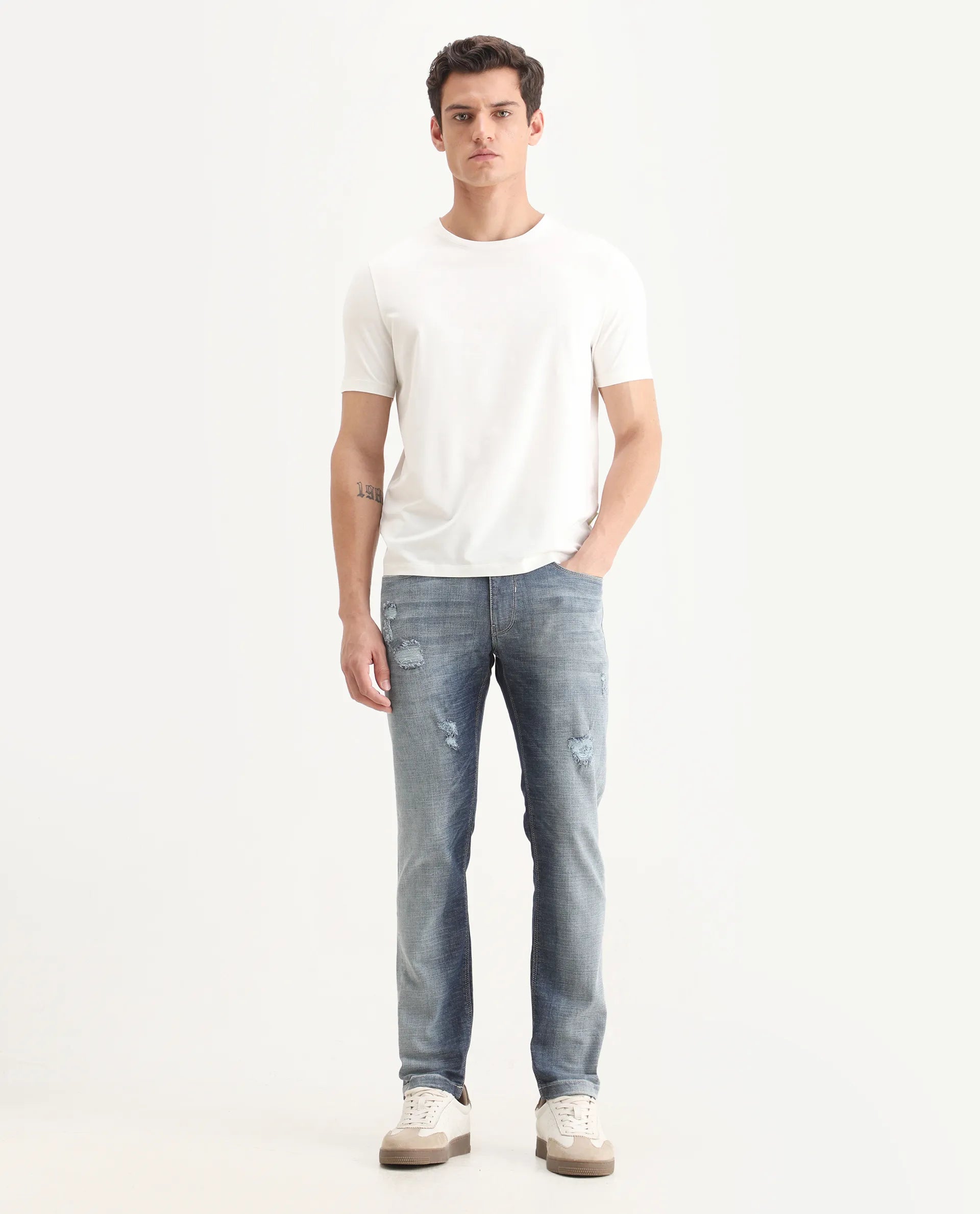 Rare Rabbit Men's Arten Light Blue Cotton Plain Hawk Slim Fit Jeans
