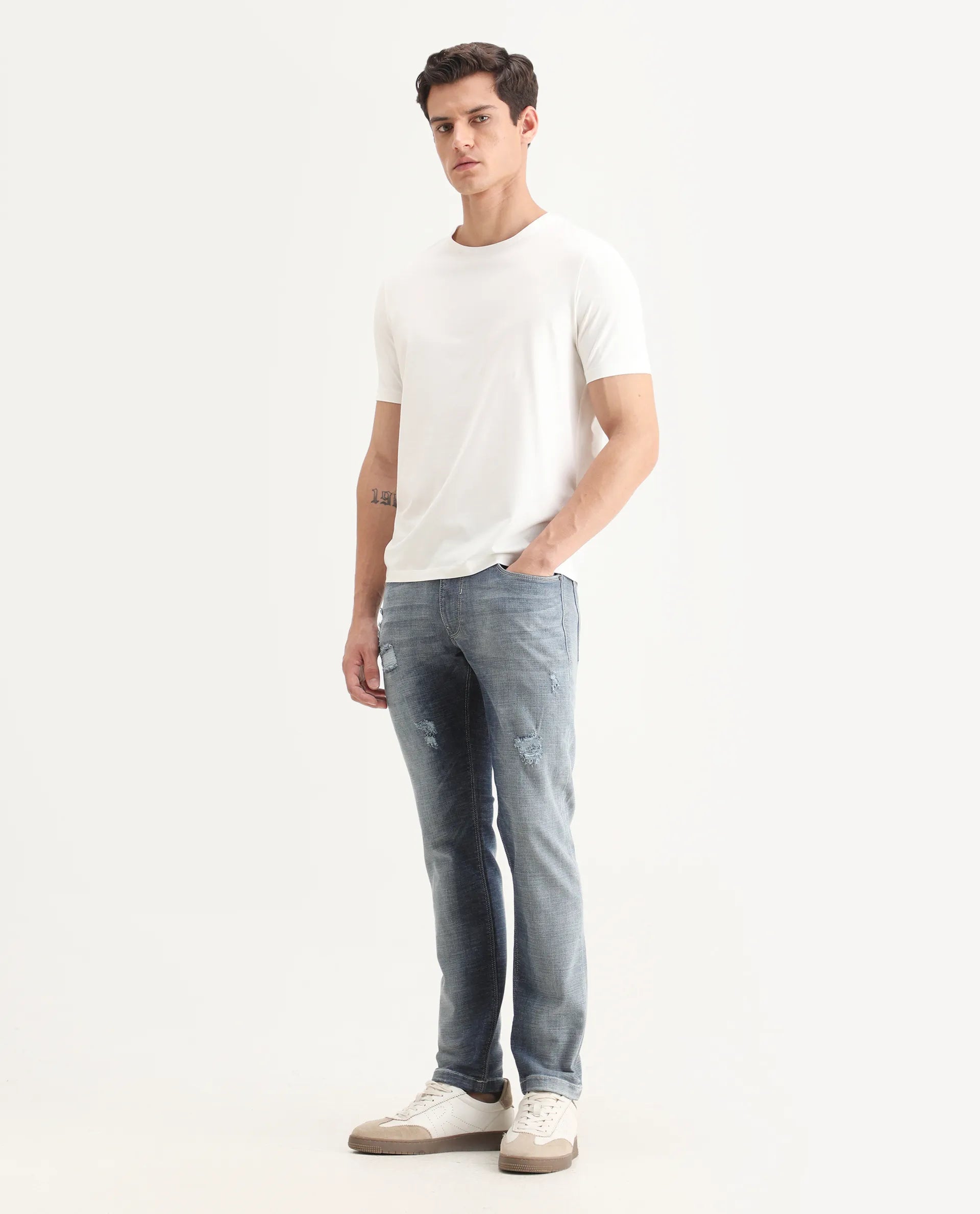 Rare Rabbit Men's Arten Light Blue Cotton Plain Hawk Slim Fit Jeans