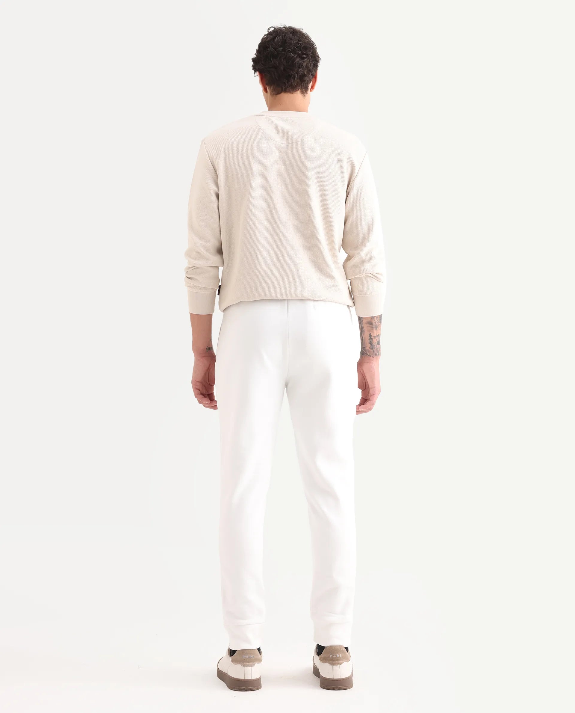 Rare Rabbit Mens Trant Off White Joggers Mid Rise Solid