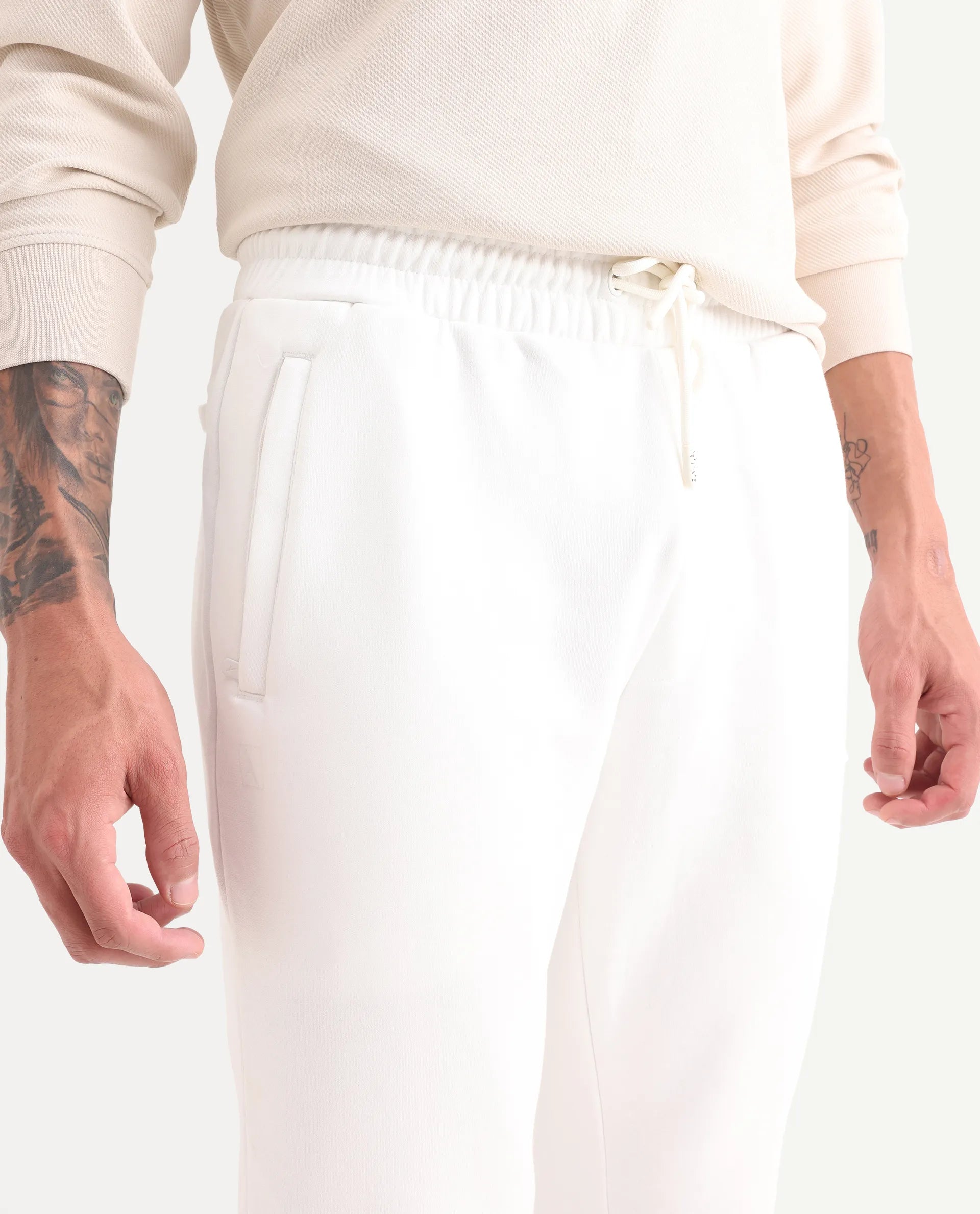 Rare Rabbit Mens Trant Off White Joggers Mid Rise Solid