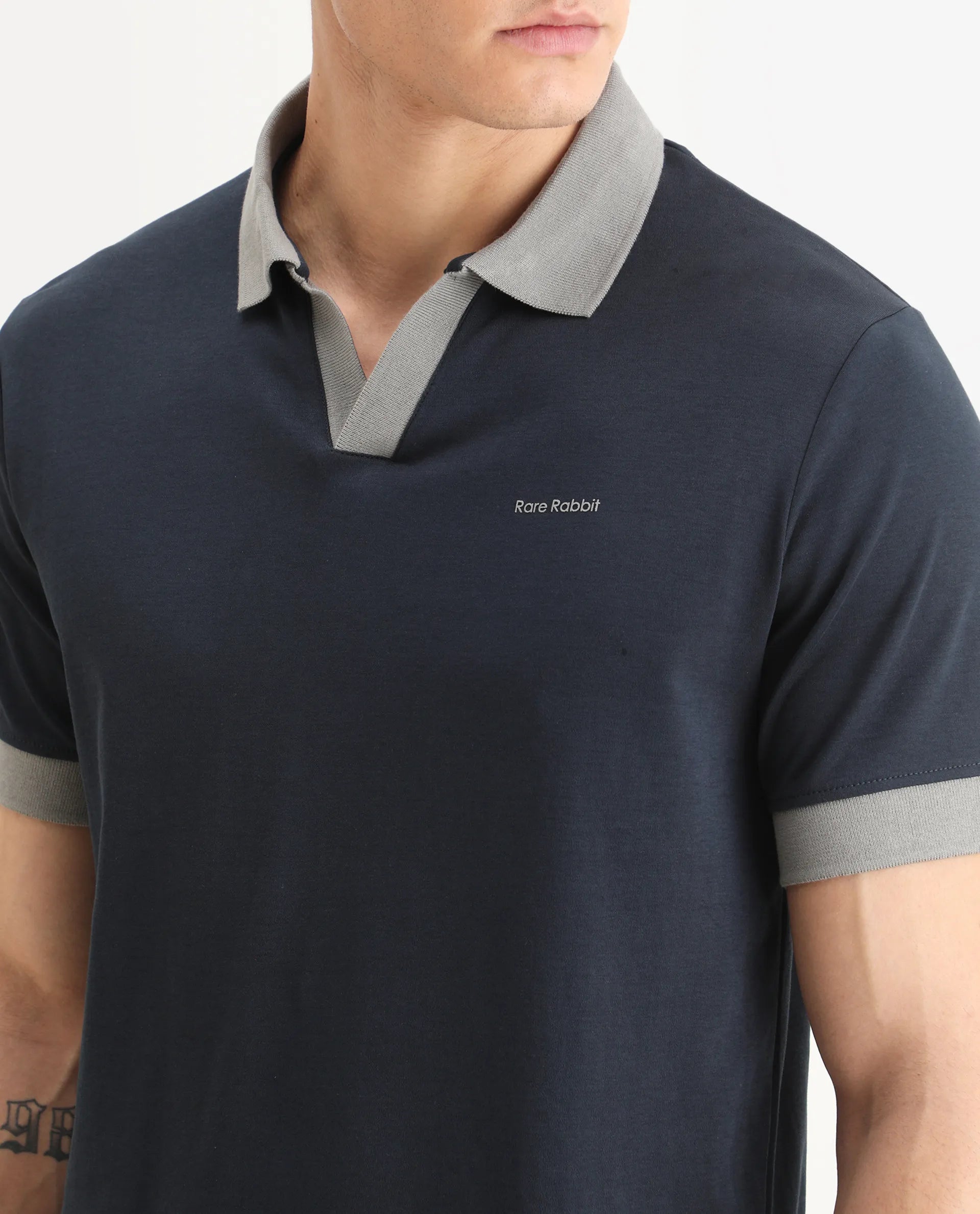Rare Rabbit Men's Carmelon Navy Cotton Plain Regular Fit Half Sleeve Polo
