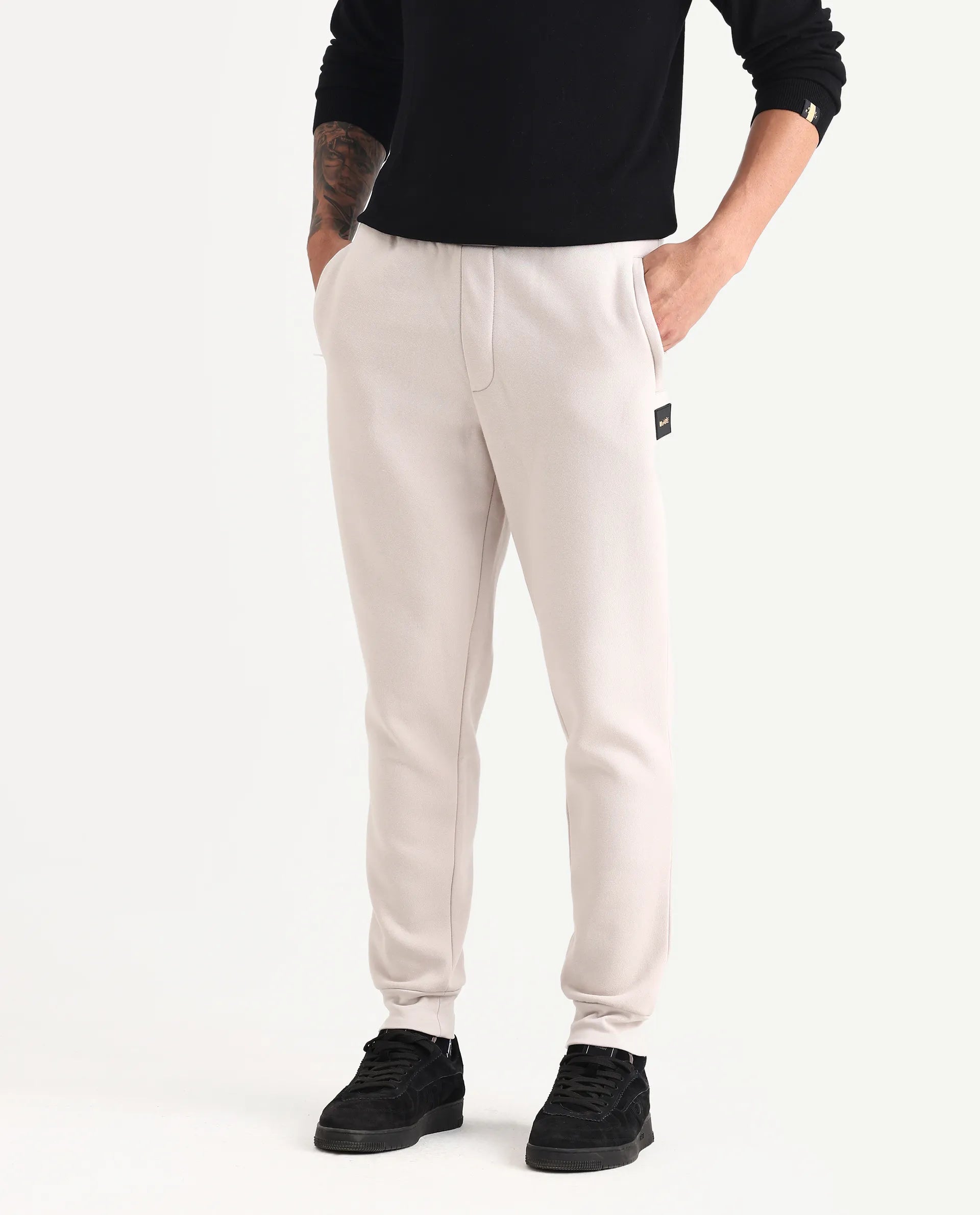 Rare Rabbit Men's Ander Off White Cotton Plain Regular Fit Track Pant