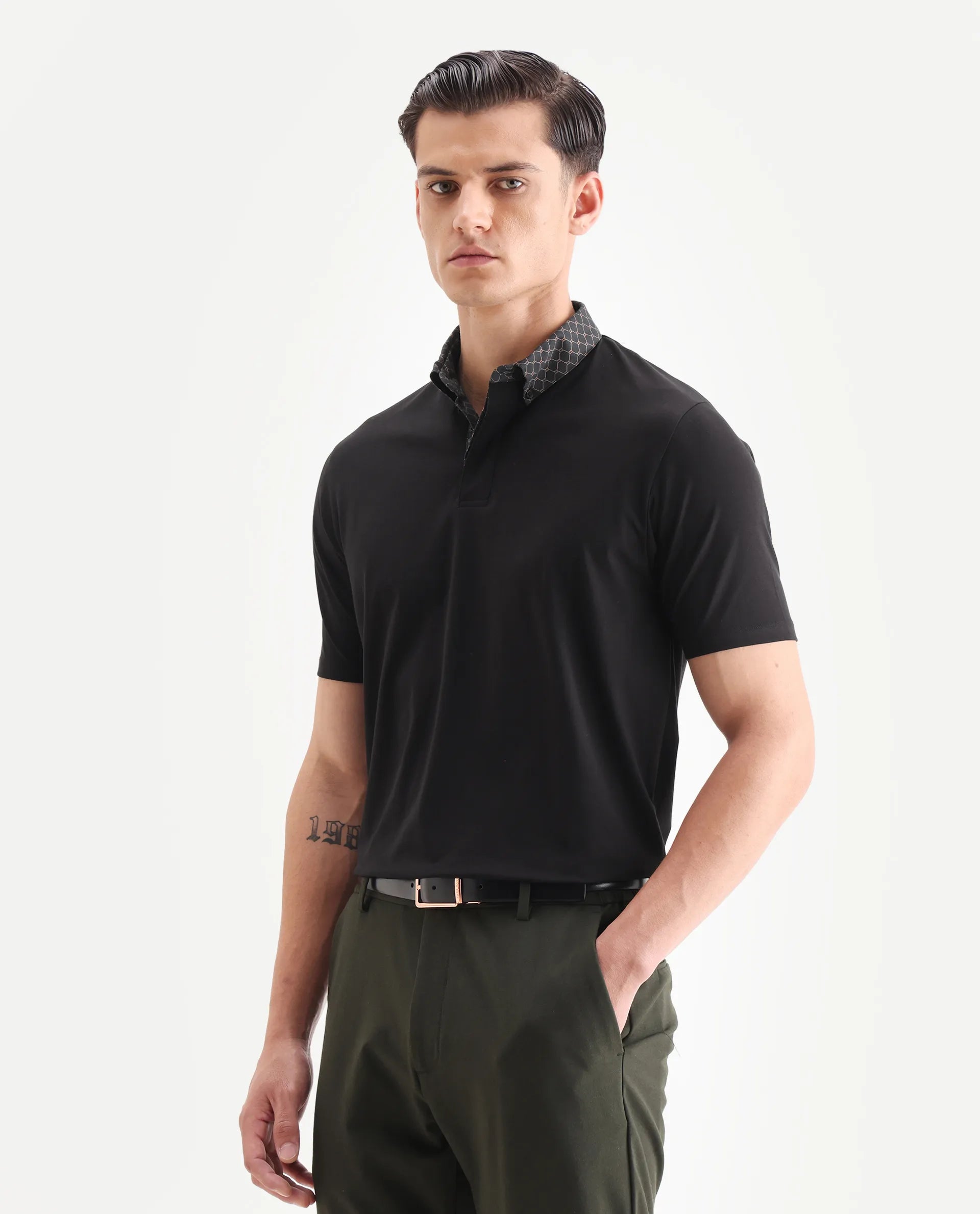 Rare Rabbit Men's Rinz Black Cotton Blend Plain Regular Fit Half Sleeve Polo