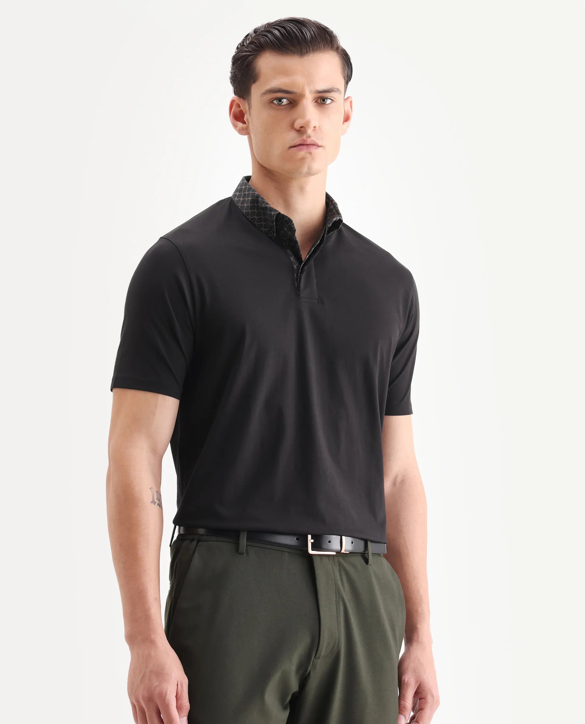 Rare Rabbit Men's Rinz Black Cotton Blend Plain Regular Fit Half Sleeve Polo