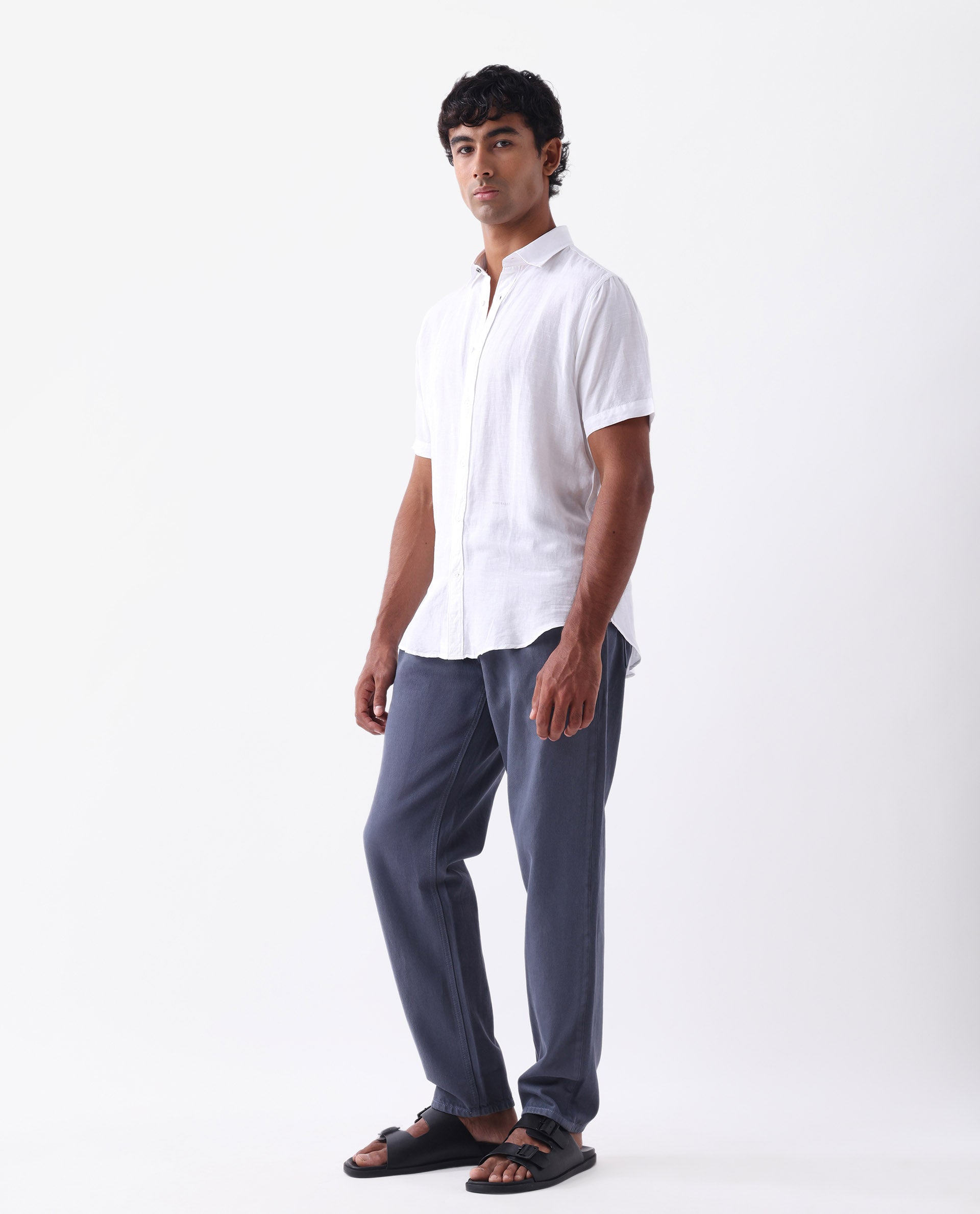 Rare Rabbit Men's Arvi Blue Cotton Plain Dond Carrot Fit Jeans