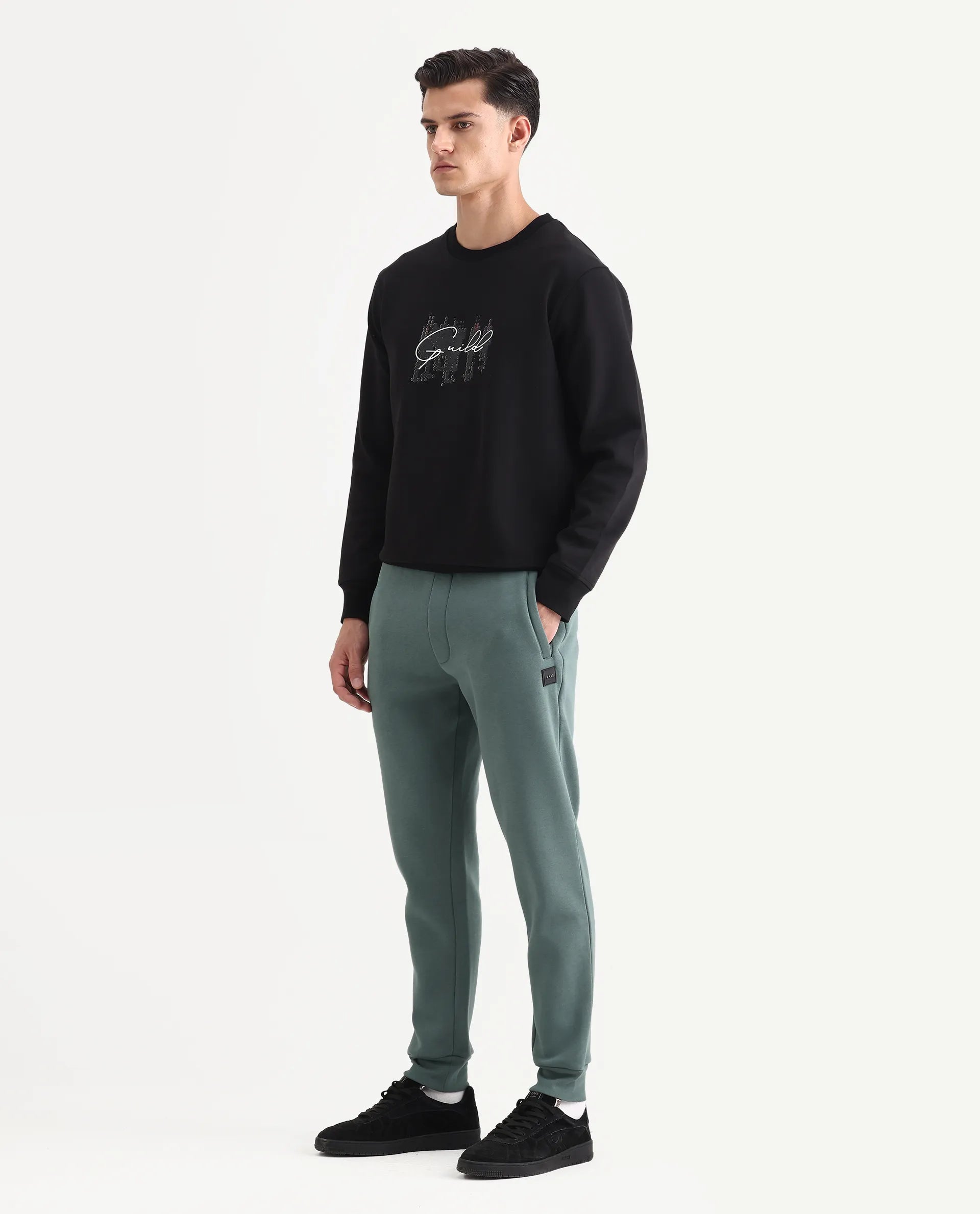 Rare Rabbit Men's Anderson-B25 Dusky Green Cotton Blend Fabric Regular Fit Badge Print Joggers