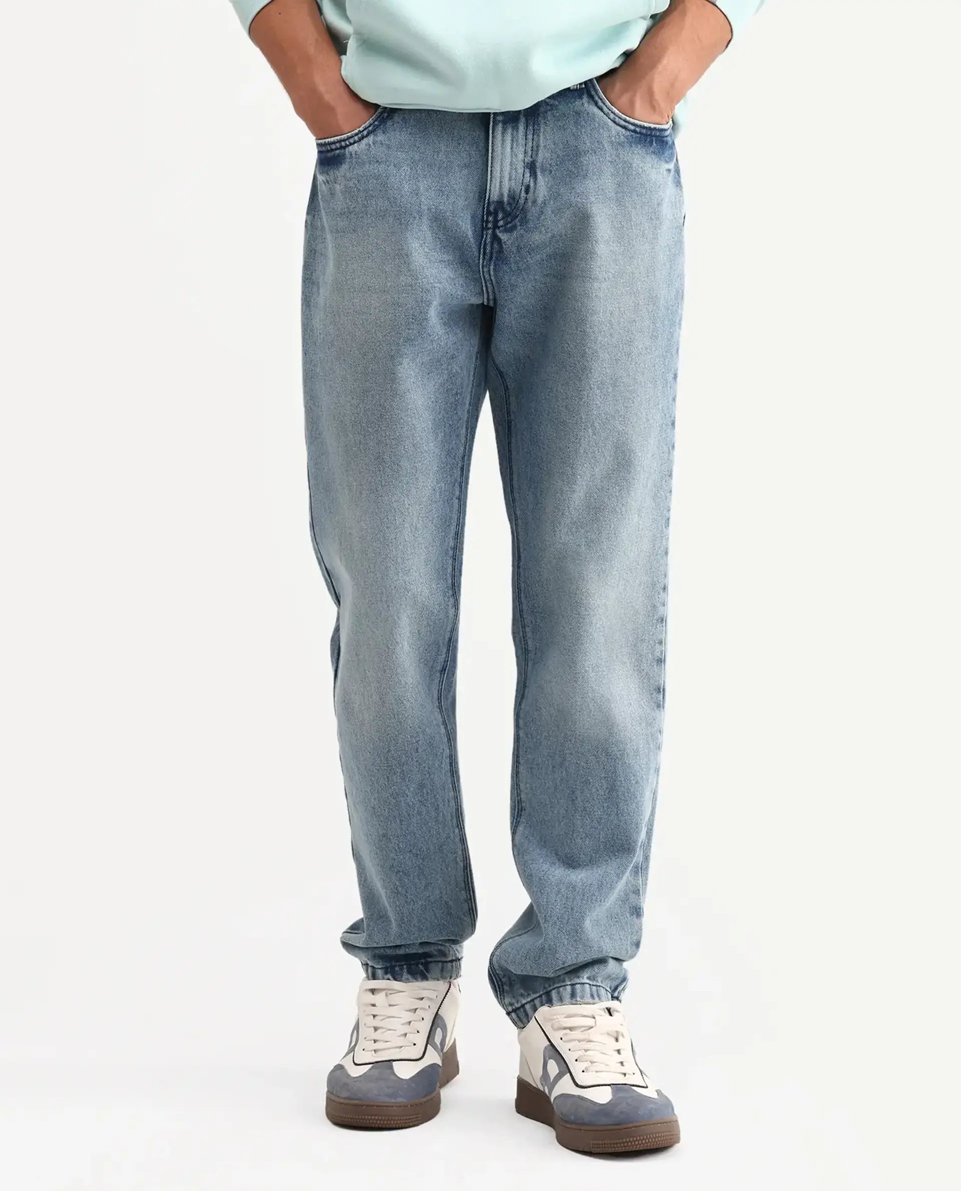 Rare Rabbit Men's Rokk Light Blue Cotton Blend Fabric Shank And Zipper Kurt Carrot Plain Jeans