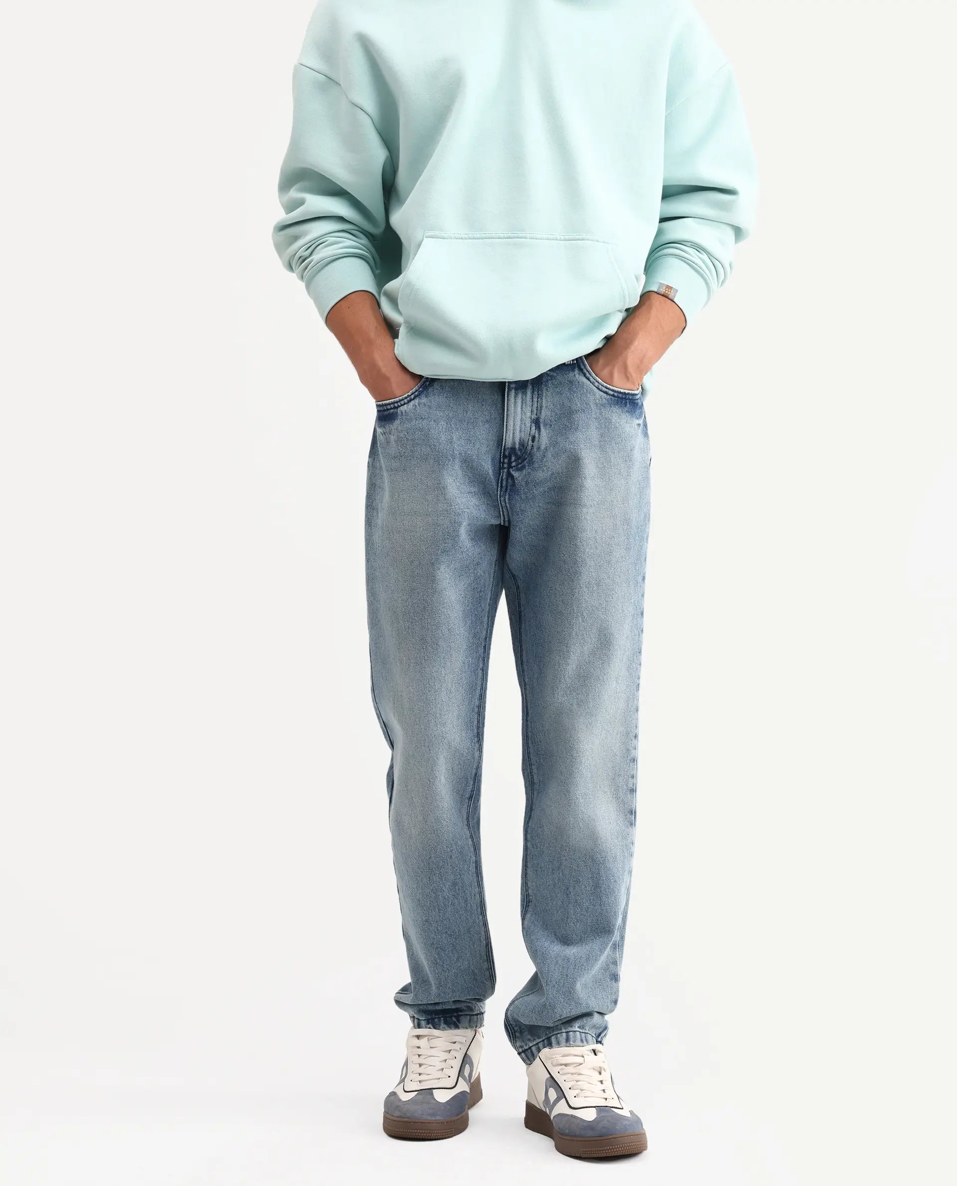 Rare Rabbit Men's Rokk Light Blue Cotton Blend Fabric Shank And Zipper Kurt Carrot Plain Jeans