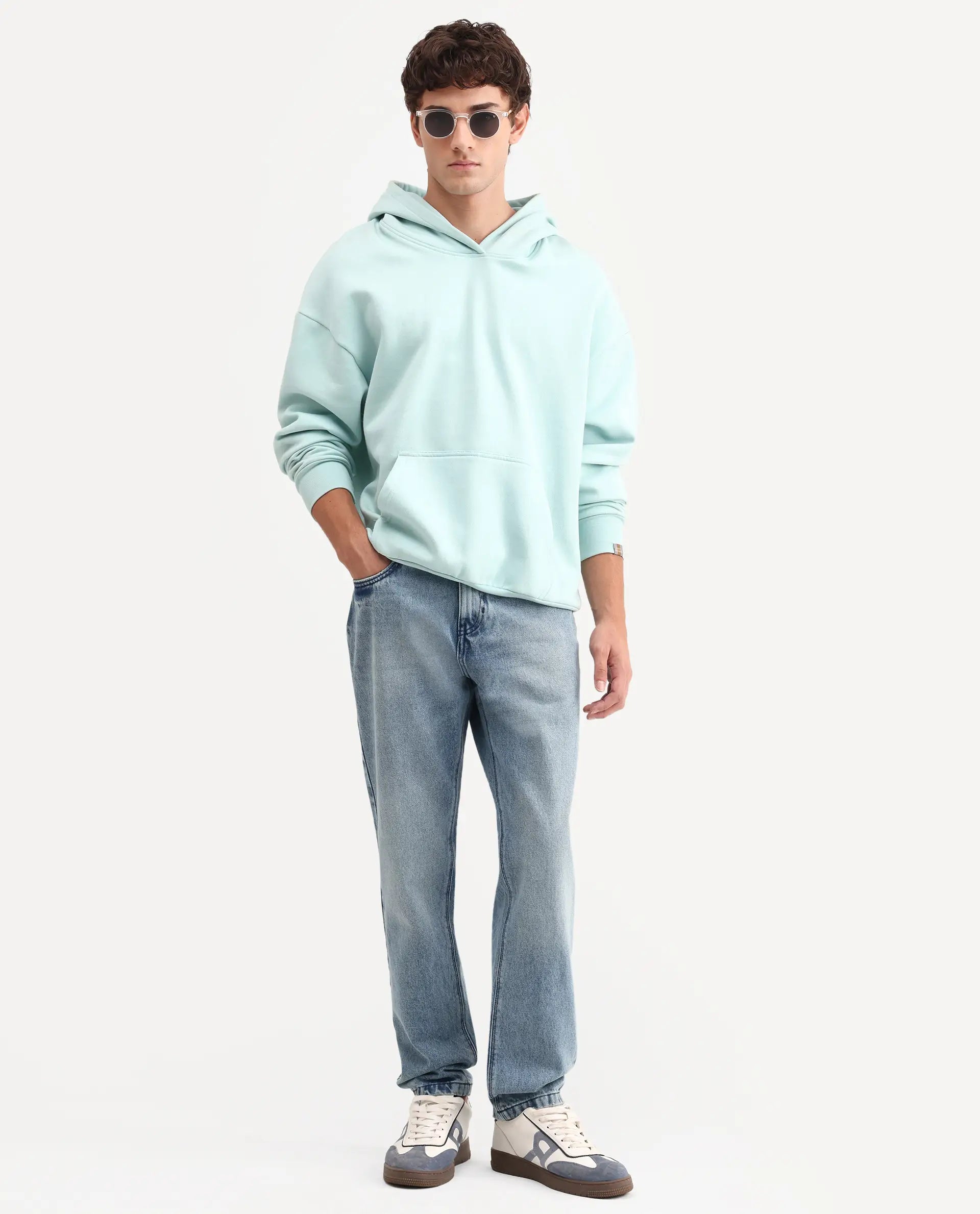 Rare Rabbit Men's Rokk Light Blue Cotton Blend Fabric Shank And Zipper Kurt Carrot Plain Jeans