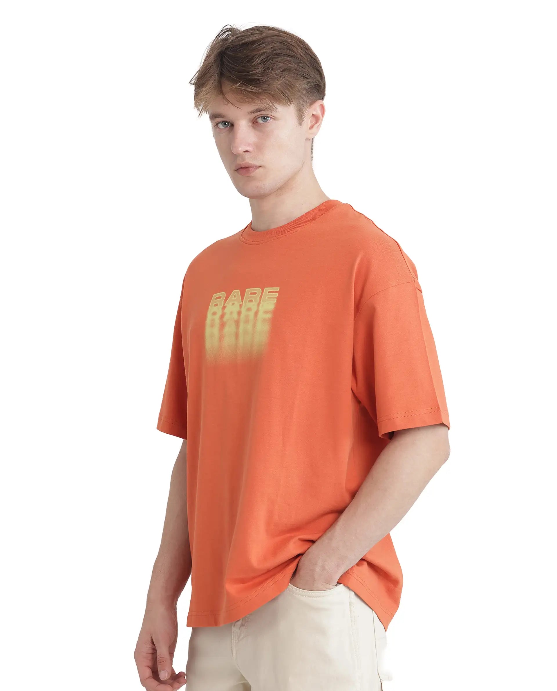 Rare Rabbit Men Act Orange Cotton Fabric Short Sleeve Crew Neck Slip-On Oversized Fit Graphic Print T-Shirt