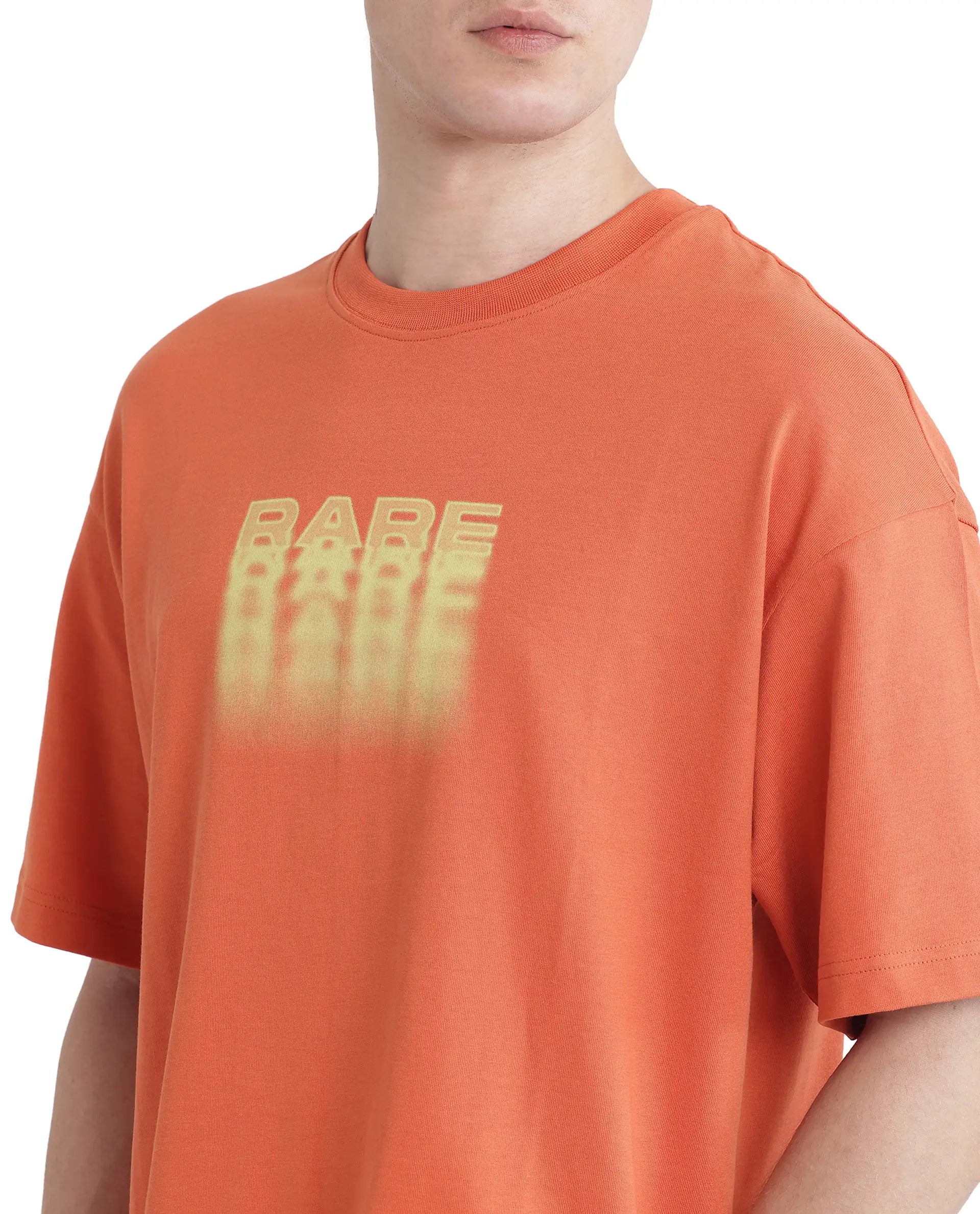 Rare Rabbit Men Act Orange Cotton Fabric Short Sleeve Crew Neck Slip-On Oversized Fit Graphic Print T-Shirt
