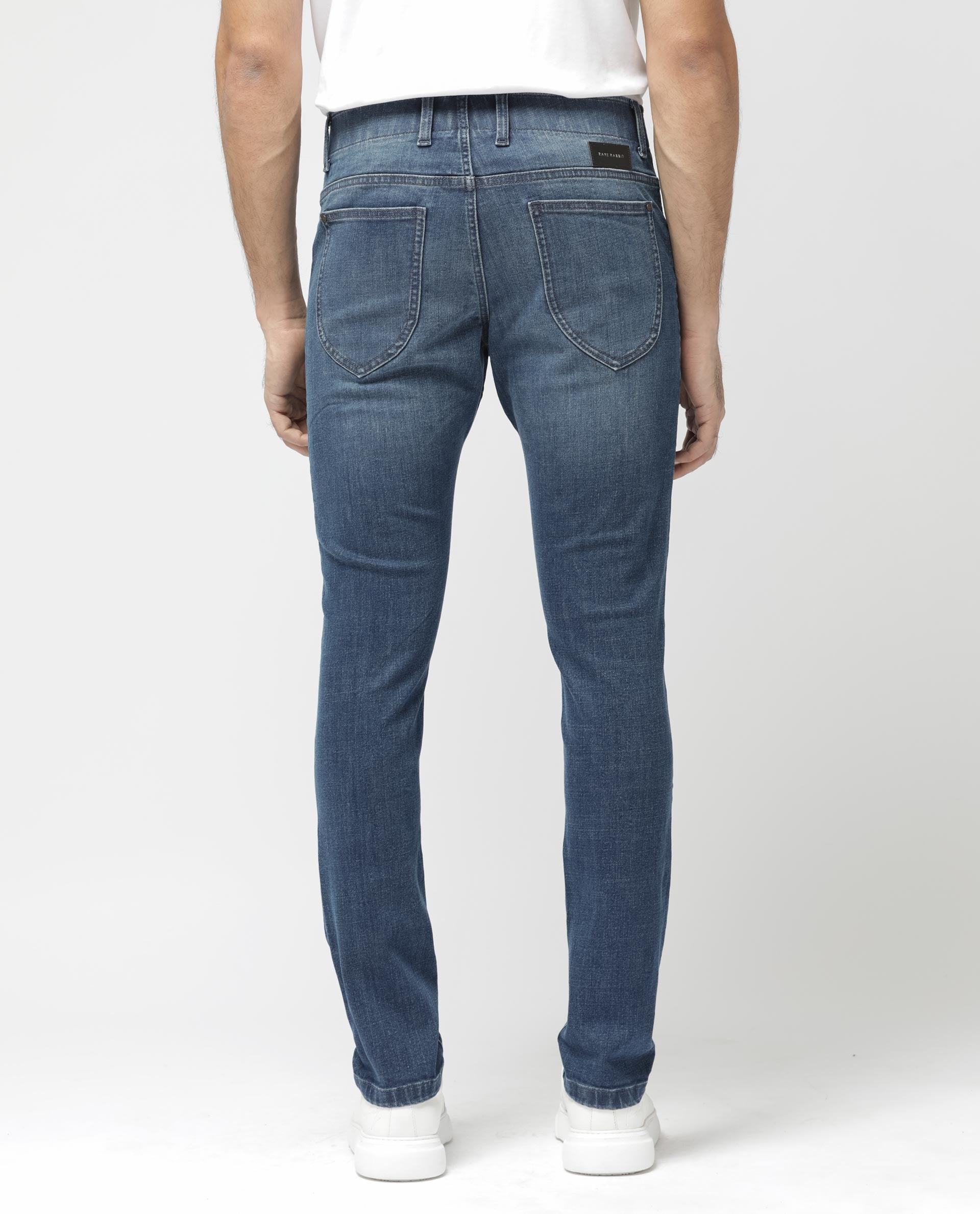 Rare Rabbit Mens Alec Blue Mid Wash Cotton Polyester Solid Skinny Fit Jeans
