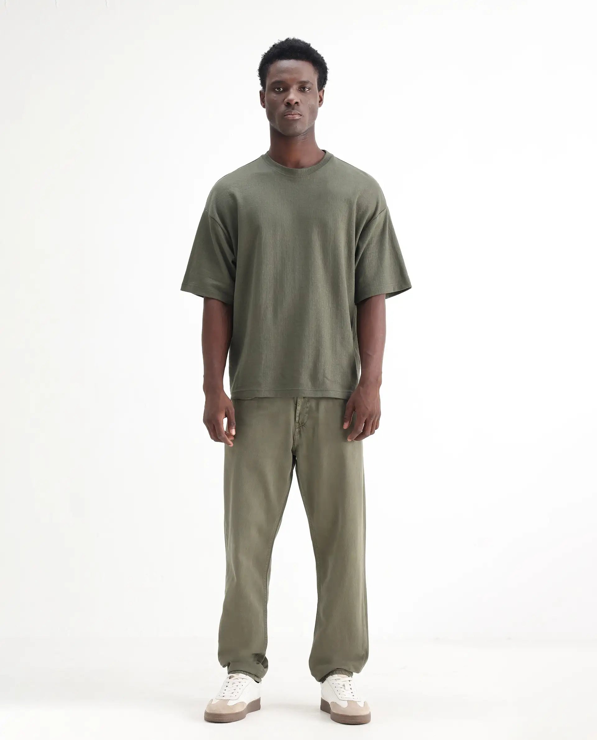 Rare Rabbit Men's Arvi Green Cotton Plain Dond Carrot Fit Jeans