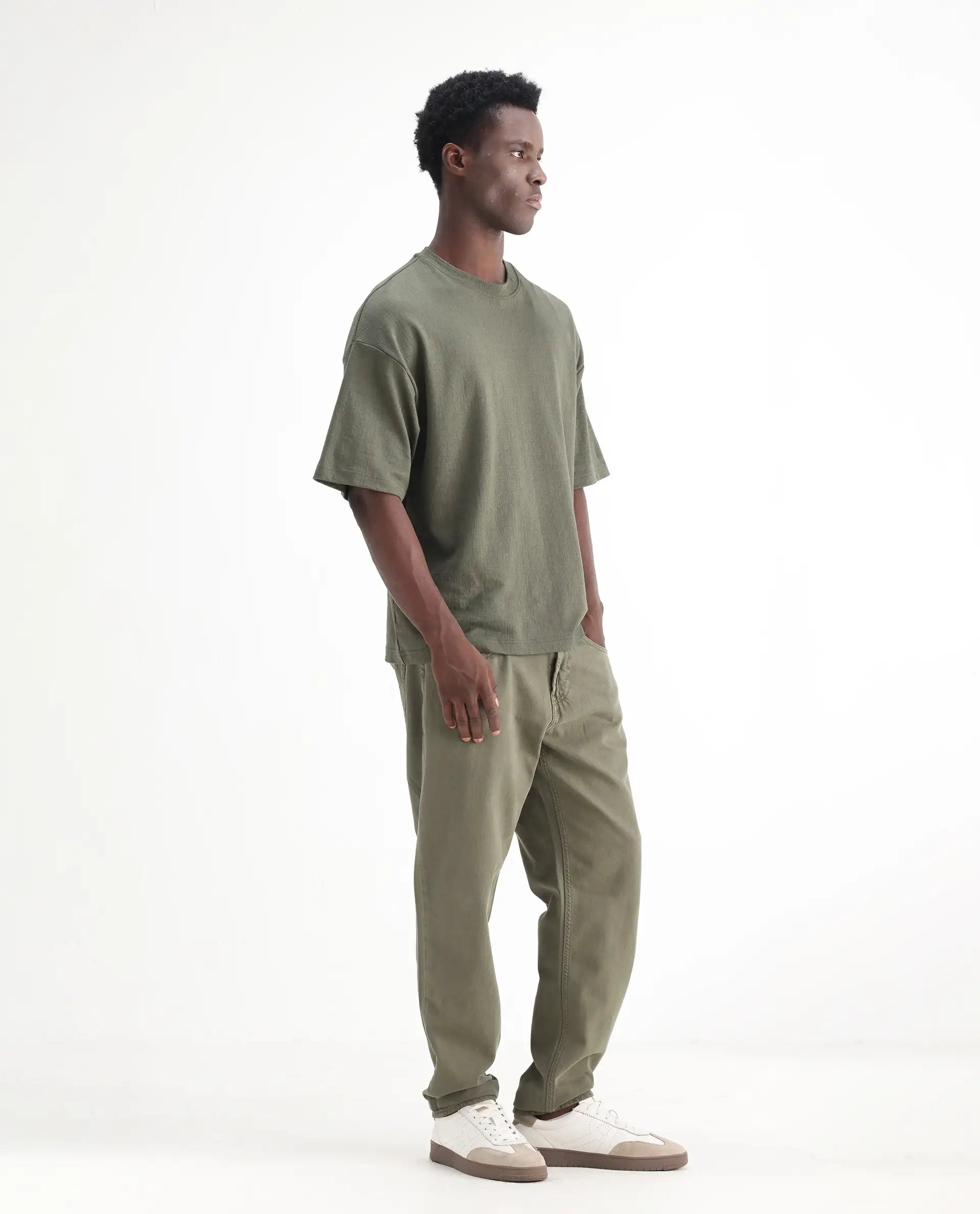 Rare Rabbit Men's Arvi Green Cotton Plain Dond Carrot Fit Jeans