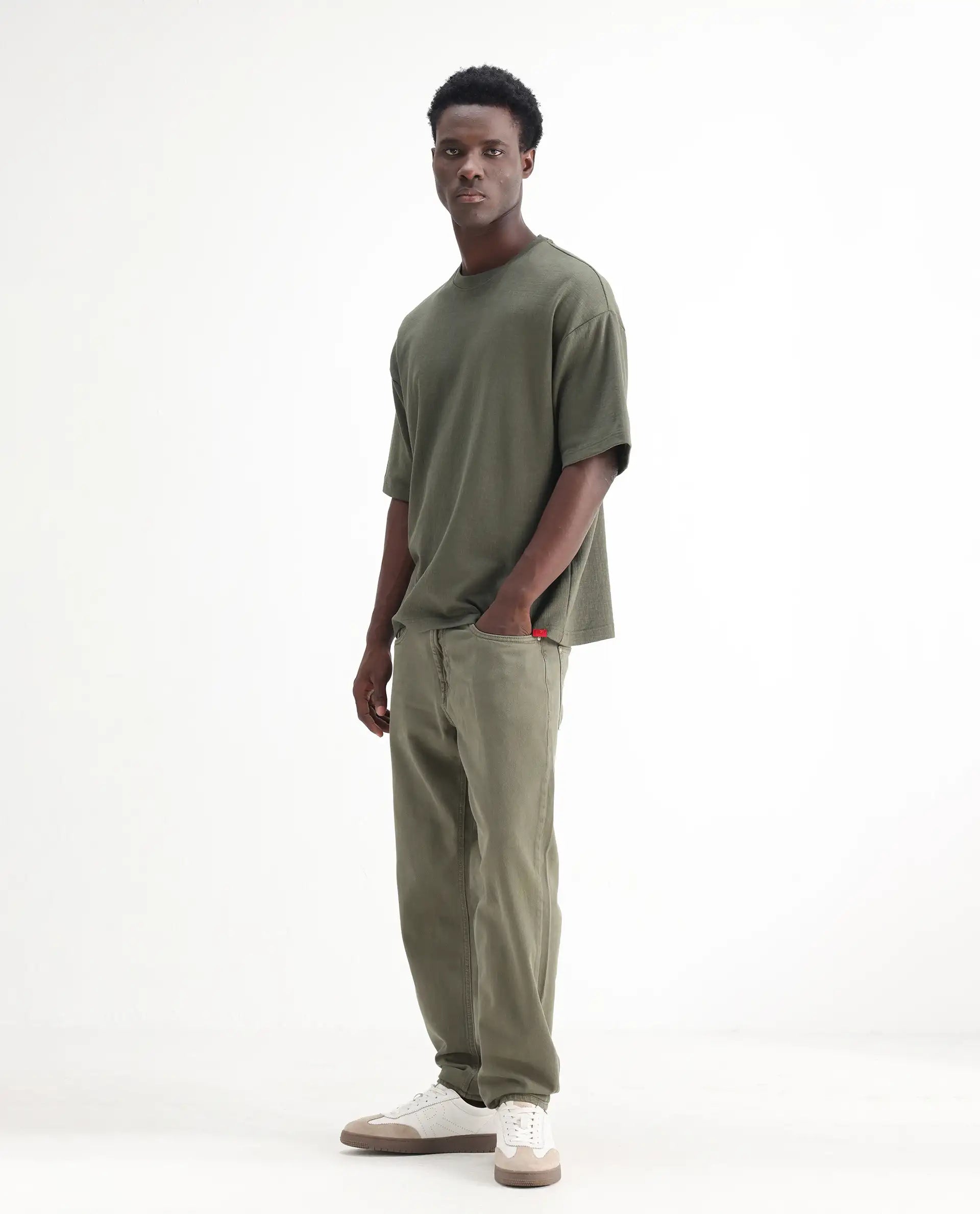 Rare Rabbit Men's Arvi Green Cotton Plain Dond Carrot Fit Jeans