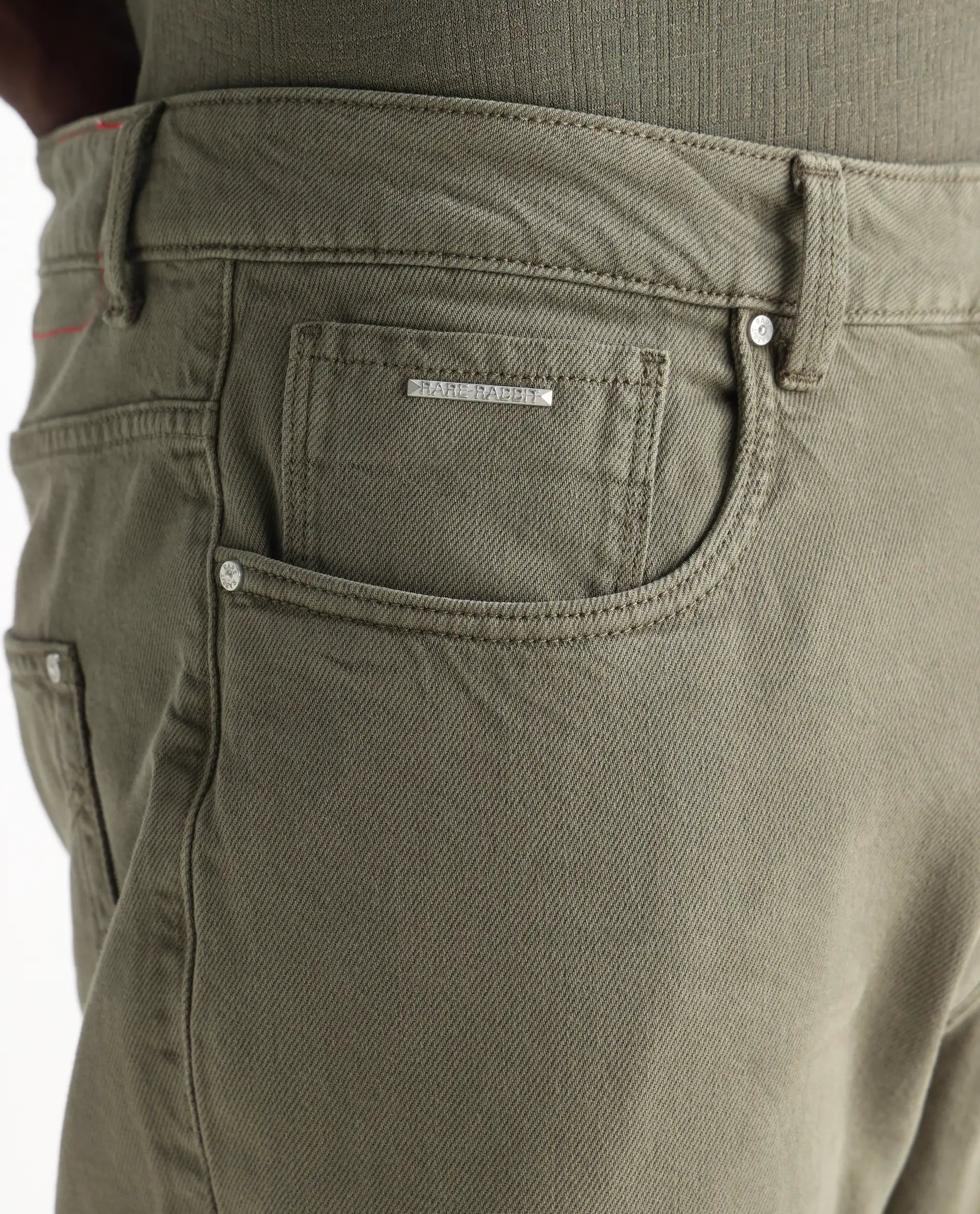 Rare Rabbit Men's Arvi Green Cotton Plain Dond Carrot Fit Jeans