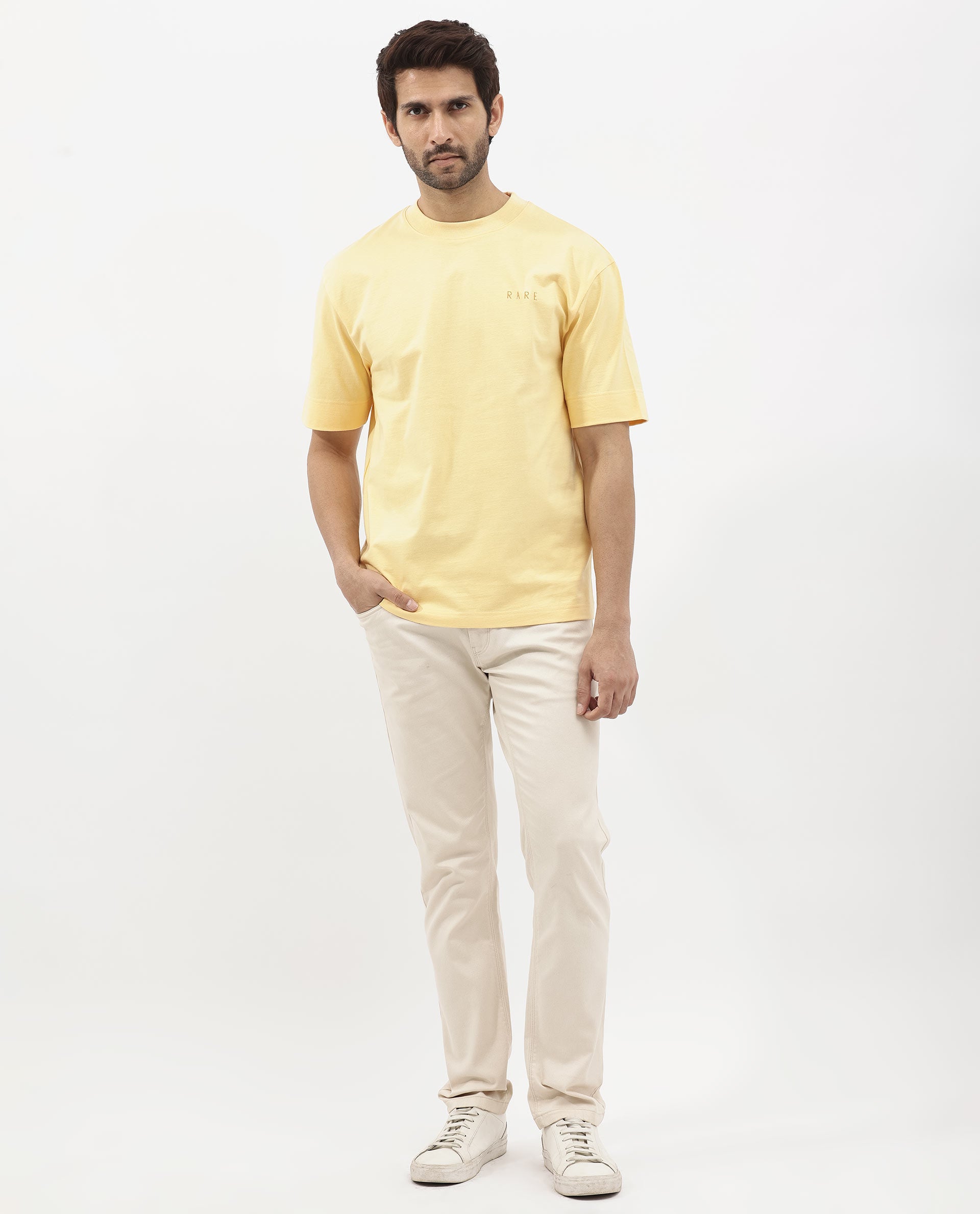 Rare Rabbit Articale Mens Beck Dusky Yellow Cotton Fabric Short Sleeve Crew Neck Oversized Fit Graphic Printed T-Shirt