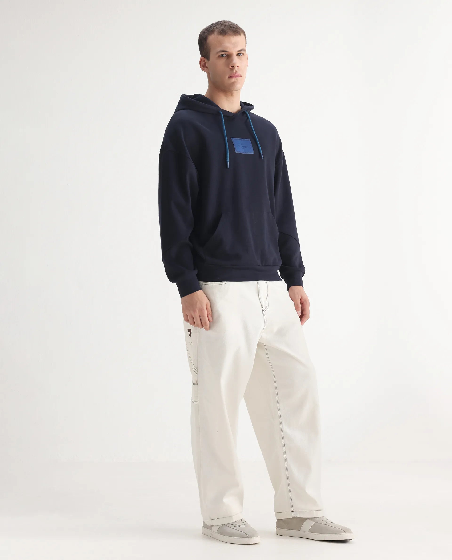 Rare Rabbit Men's Cade White Cotton Plain Baggy Fit Jeans