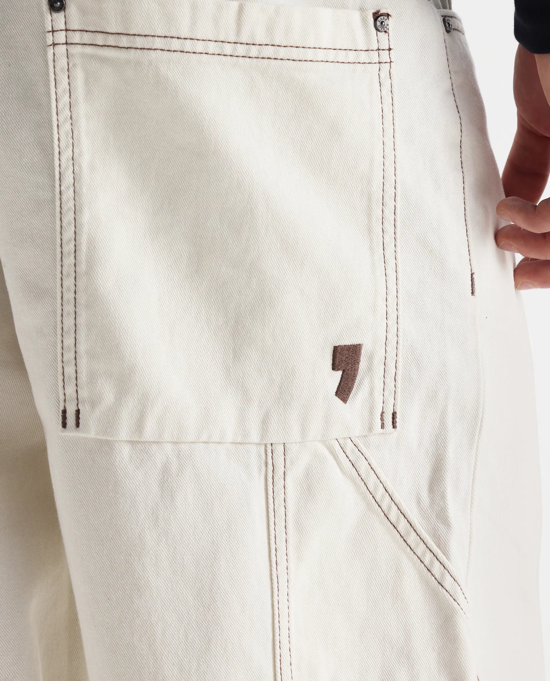 Rare Rabbit Men's Cade White Cotton Plain Baggy Fit Jeans