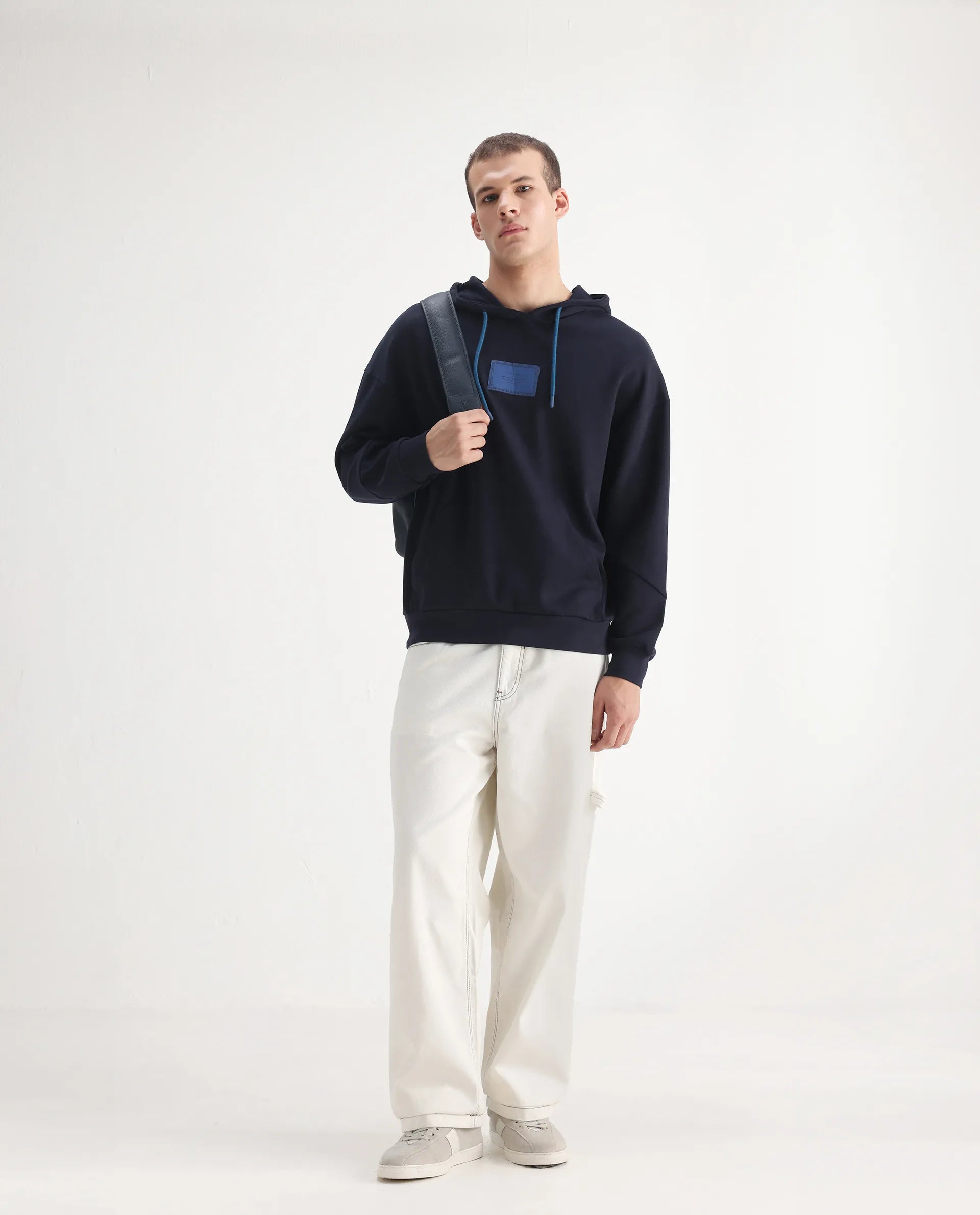 Rare Rabbit Men's Cade White Cotton Plain Baggy Fit Jeans