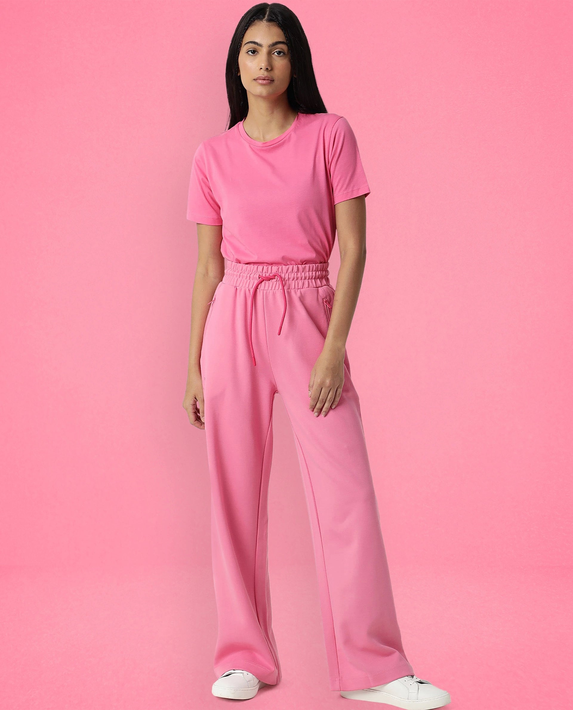 Rareism Women Capsule Flouroscent Pink Cotton Blend Fabric Relaxed Fit Solid Mid Rise Ankle Length Track Pant