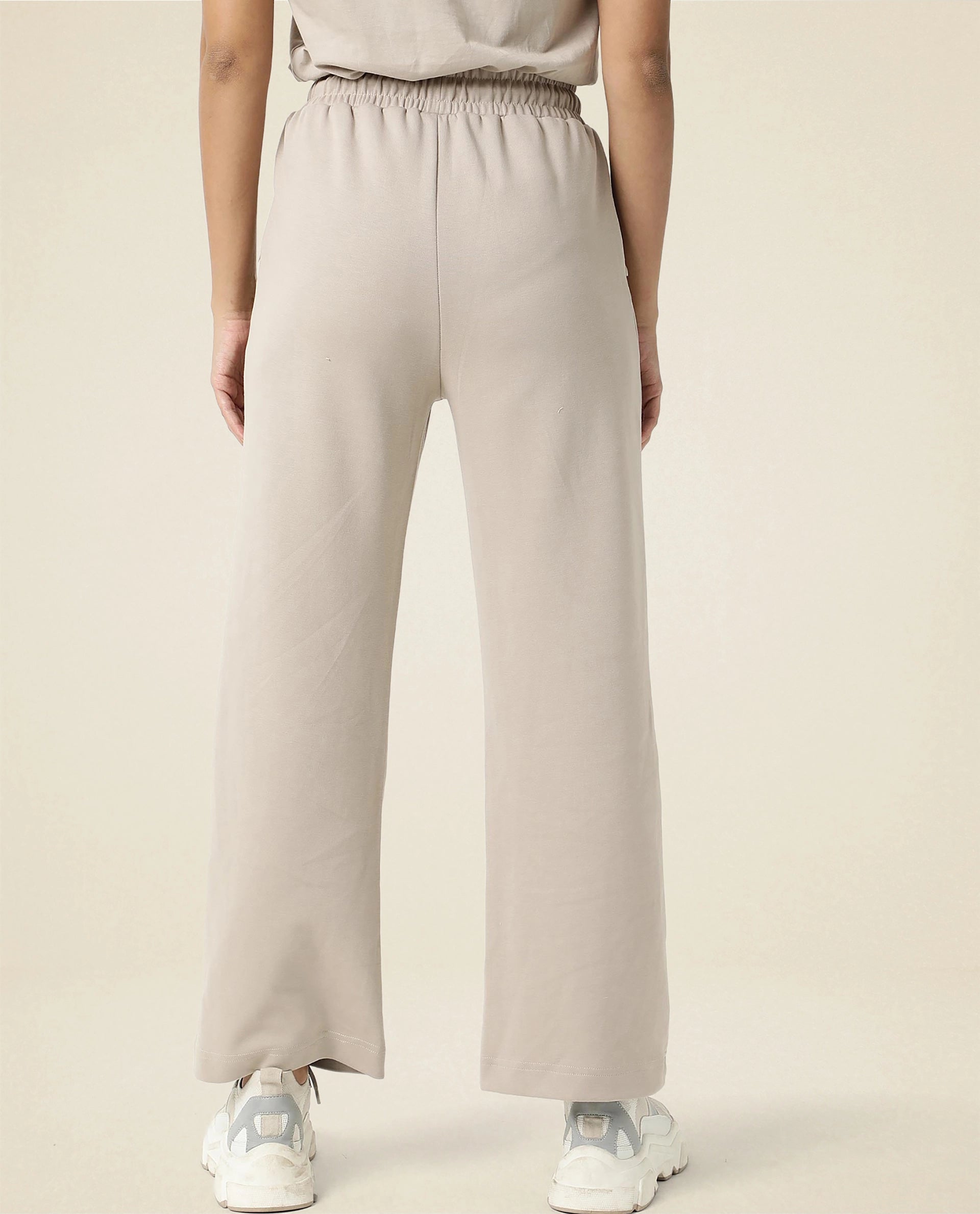 Rareism Women Capsule Beige Cotton Blend Fabric Relaxed Fit Solid Mid Rise Ankle Length Track Pant