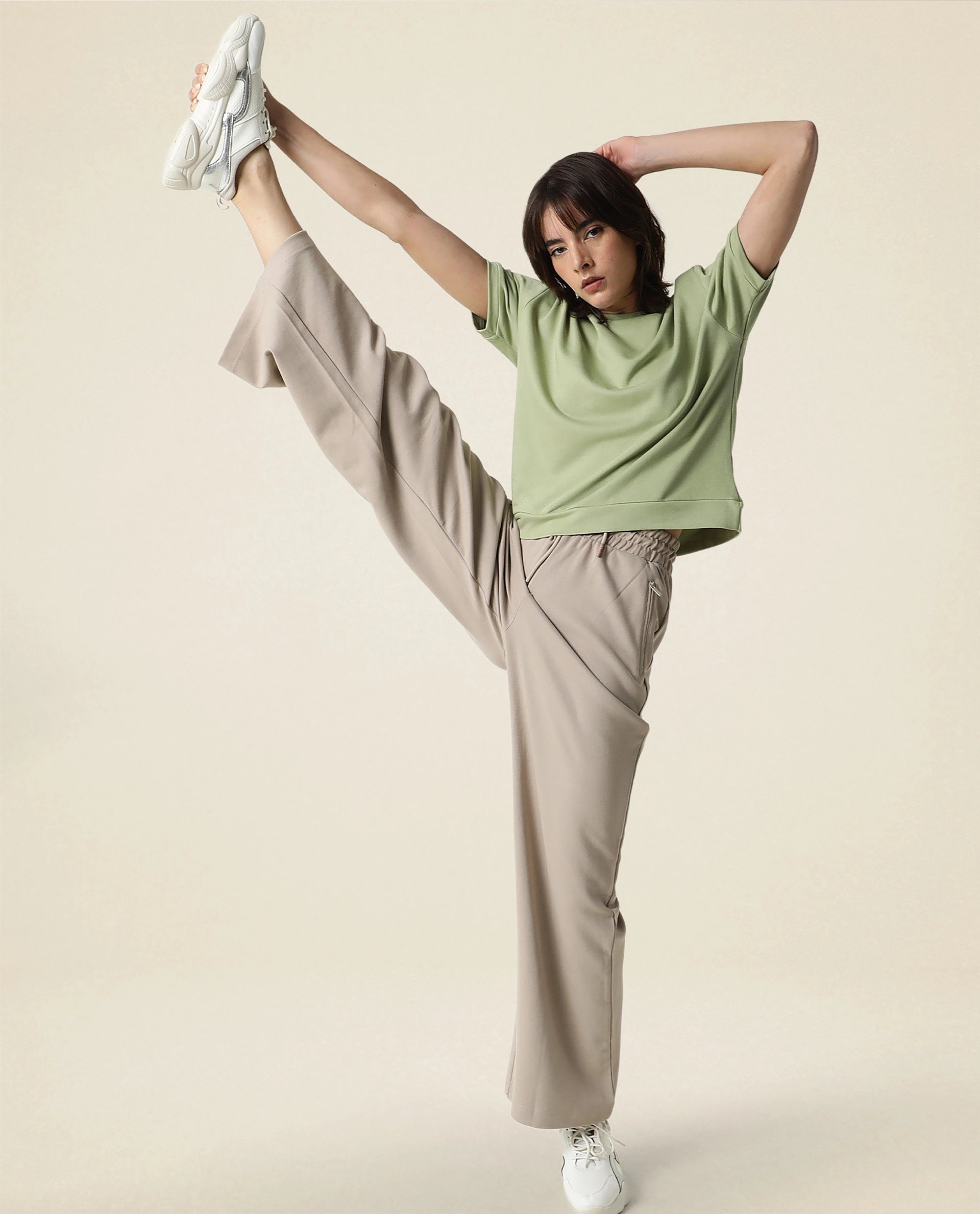 Rareism Women Capsule Beige Cotton Blend Fabric Relaxed Fit Solid Mid Rise Ankle Length Track Pant