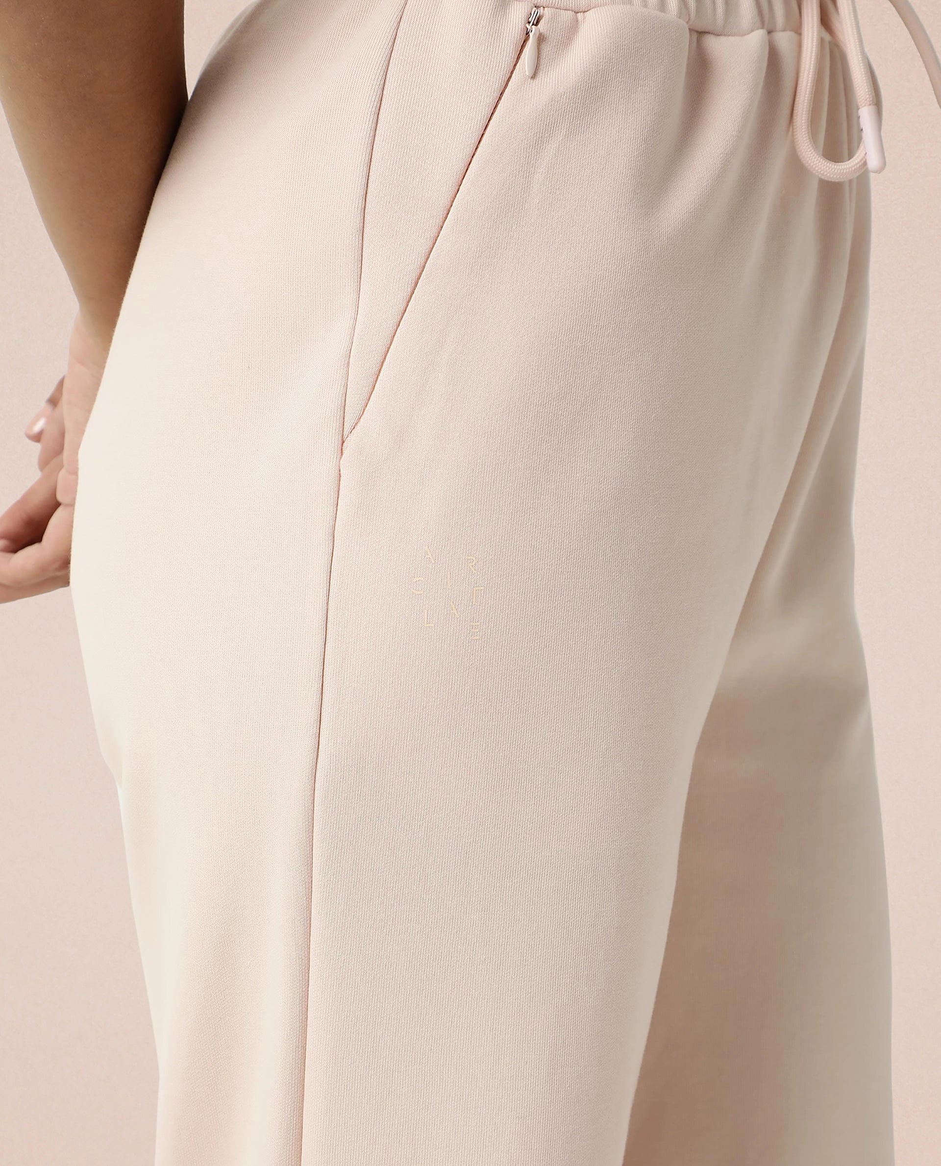 Rareism Women Capsule Pink Cotton Blend Fabric Relaxed Fit Solid Mid Rise Ankle Length Track Pant