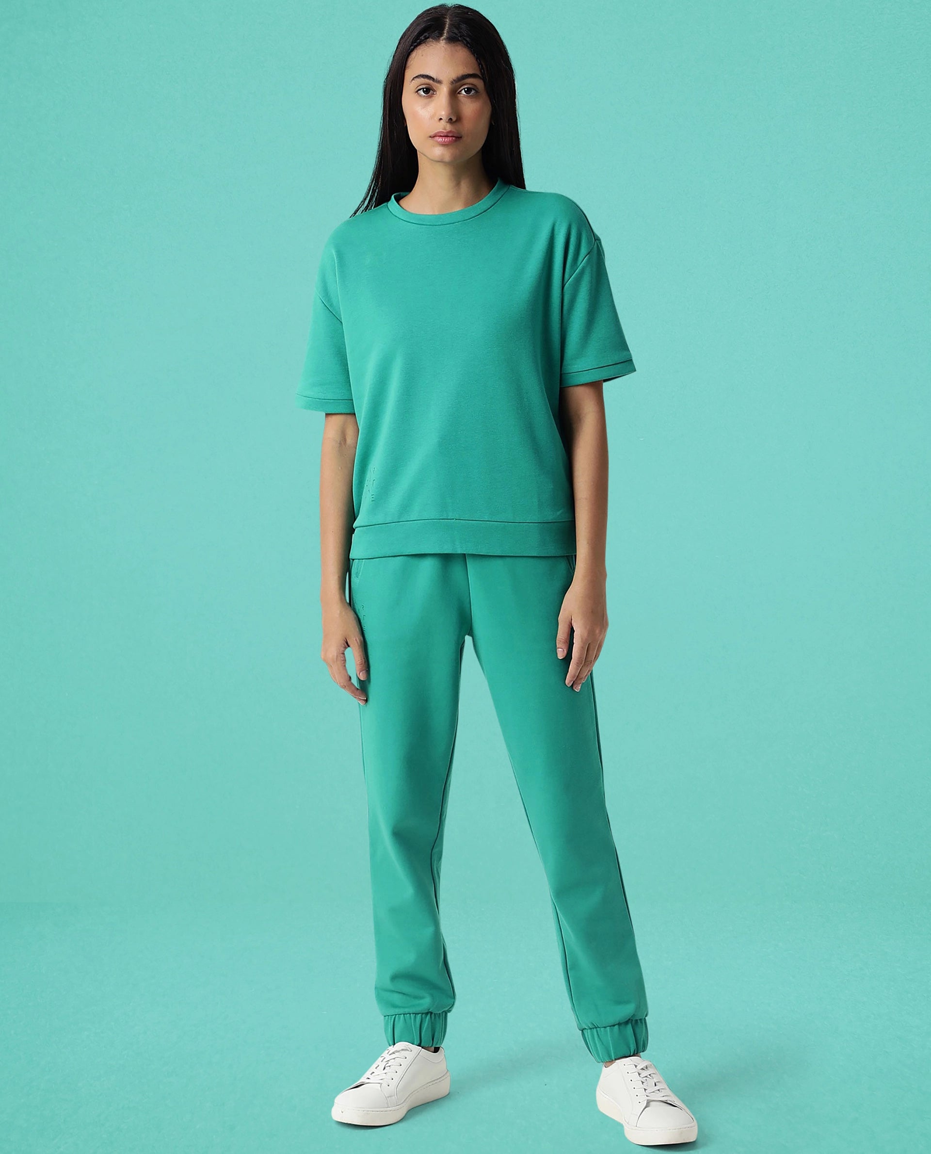 Rareism Women Coco Green Cotton Fabric Half Sleeves Relaxed Fit Solid Round Neck Sweat Tee