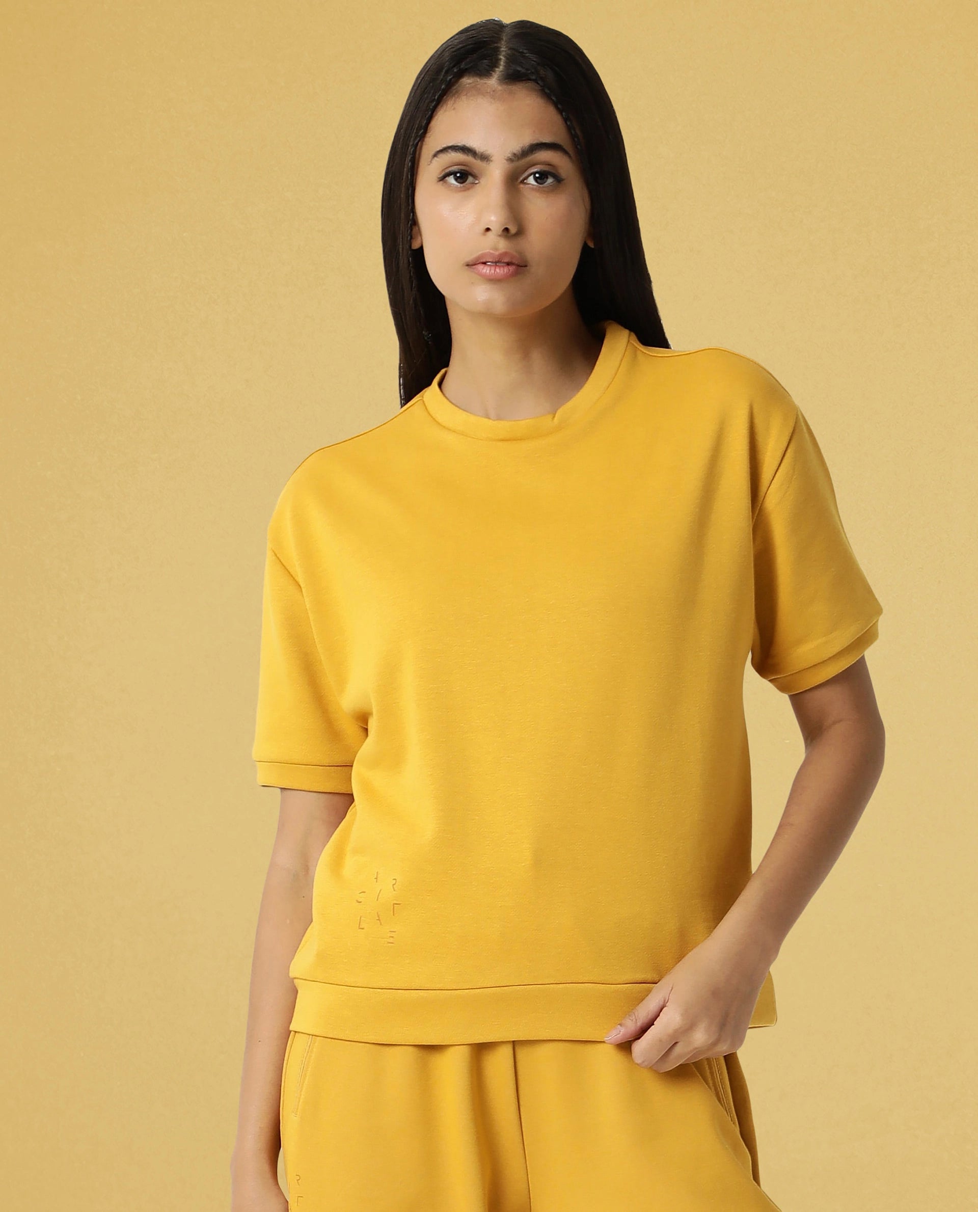 Rareism Women Coco Mustard Cotton Fabric Half Sleeves Relaxed Fit Solid Round Neck Sweat Tee
