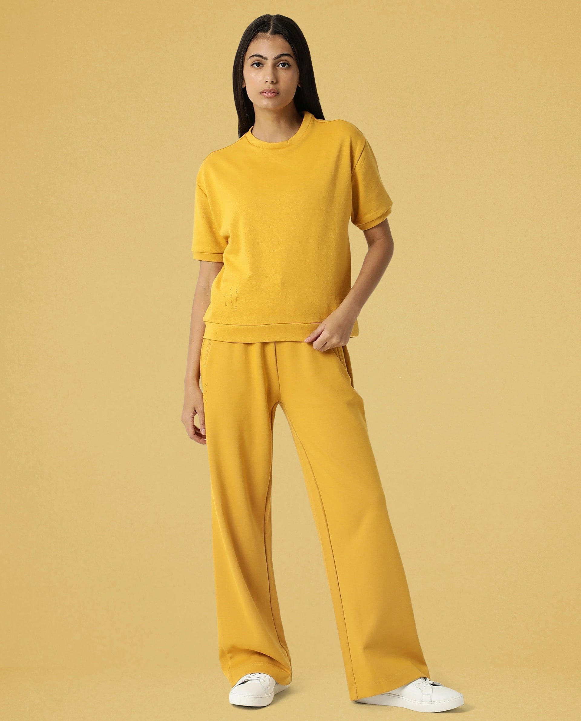 Rareism Women Coco Mustard Cotton Fabric Half Sleeves Relaxed Fit Solid Round Neck Sweat Tee