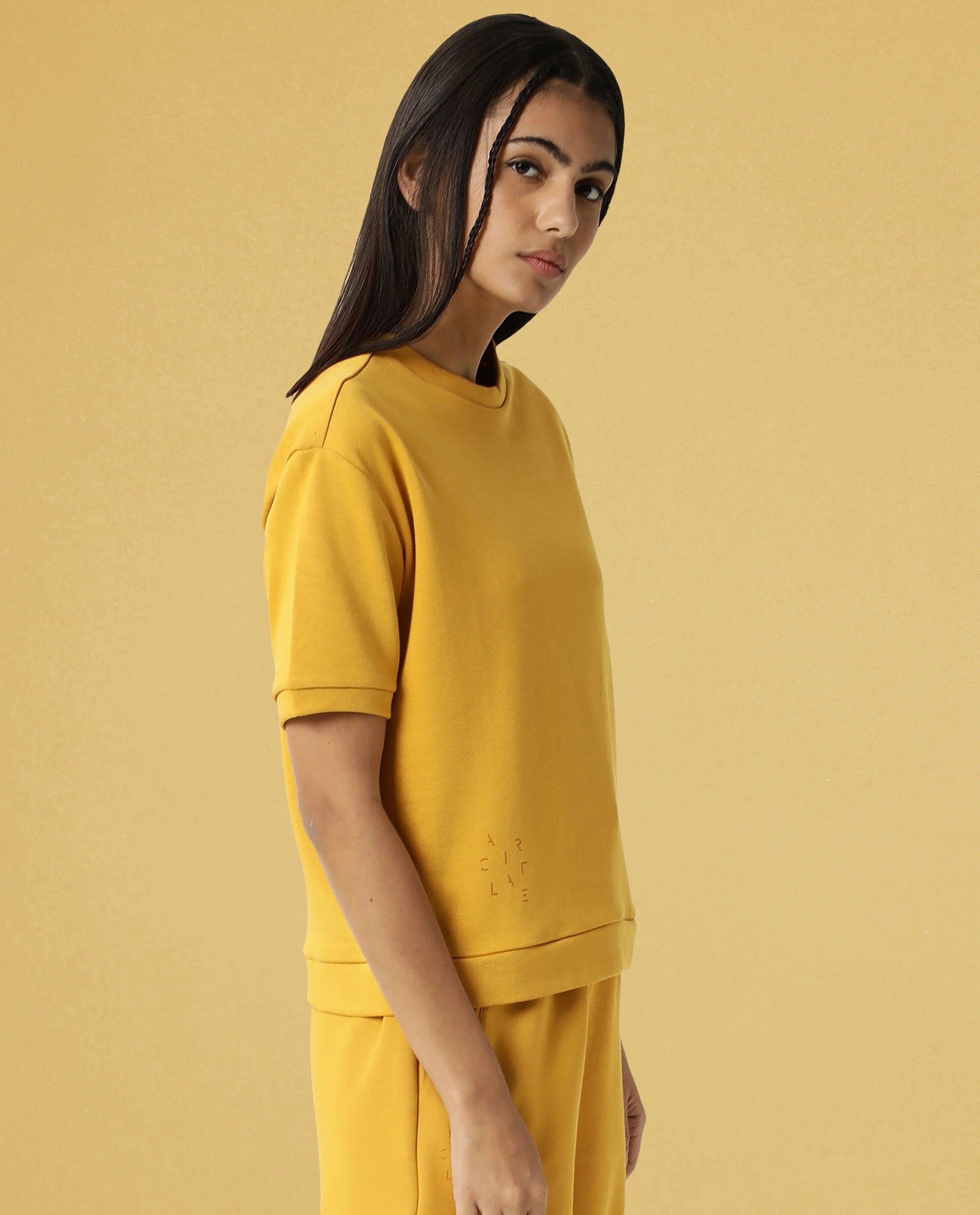 Rareism Women Coco Mustard Cotton Fabric Half Sleeves Relaxed Fit Solid Round Neck Sweat Tee