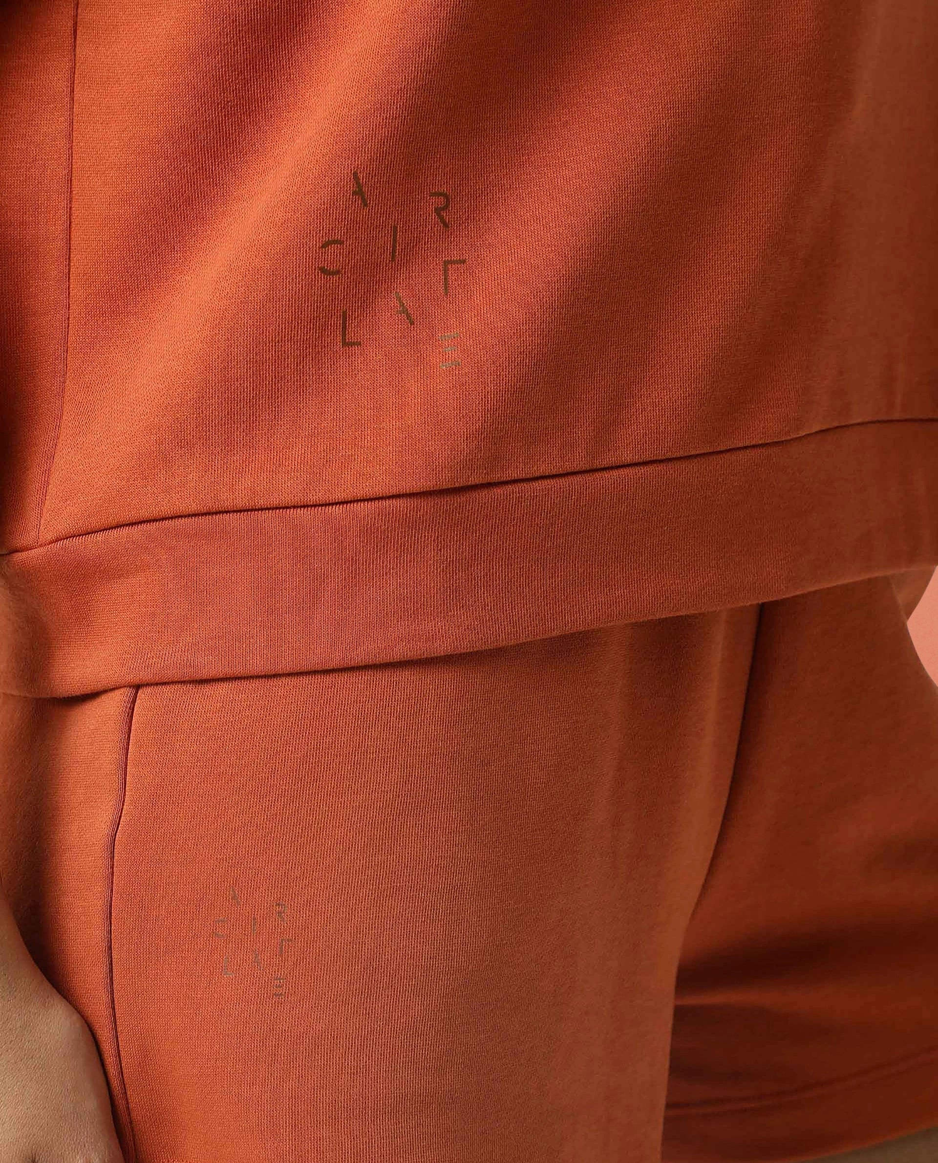 Rareism Women Coco Orange Cotton Fabric Half Sleeves Relaxed Fit Solid Round Neck Sweat Tee