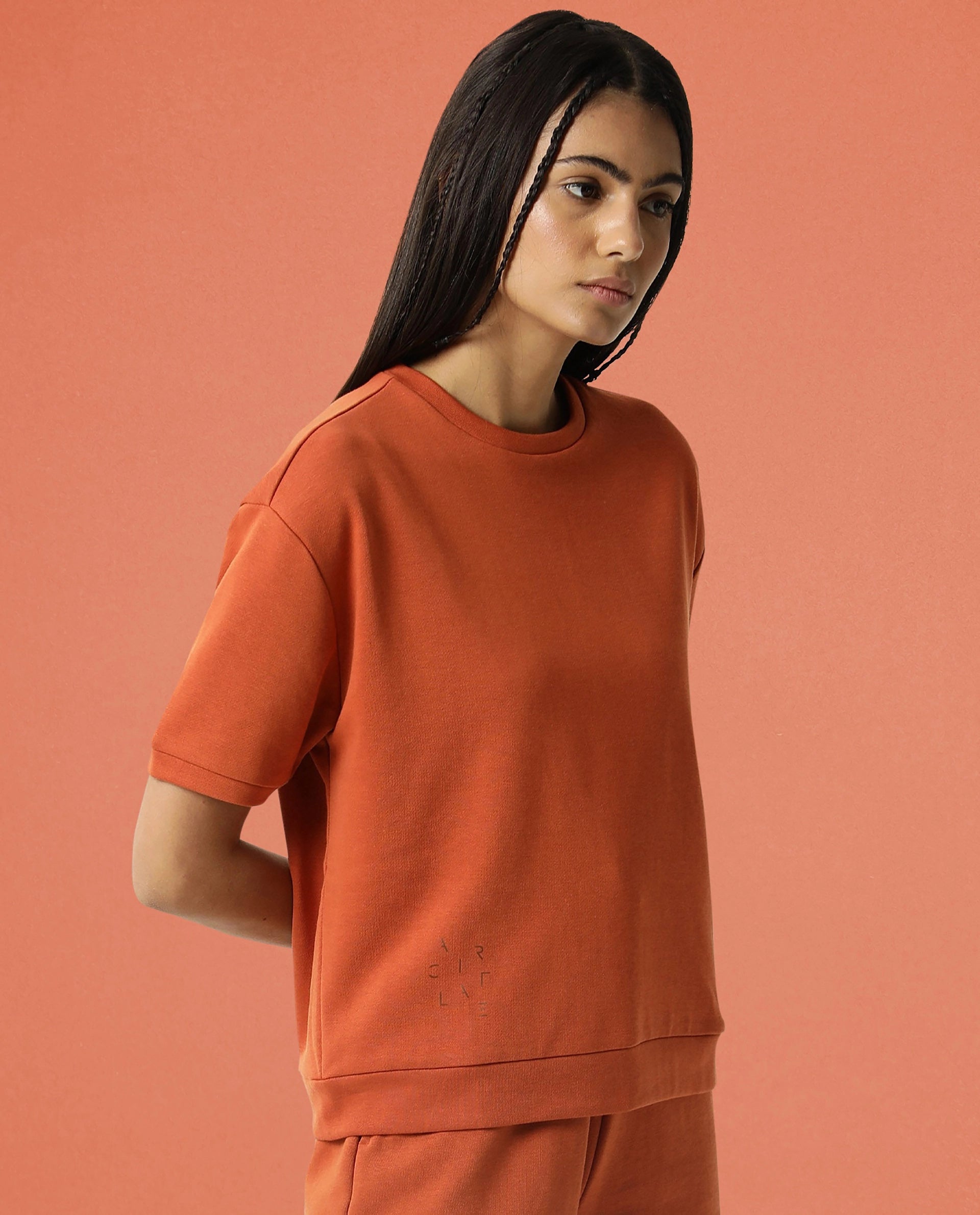 Rareism Women Coco Orange Cotton Fabric Half Sleeves Relaxed Fit Solid Round Neck Sweat Tee