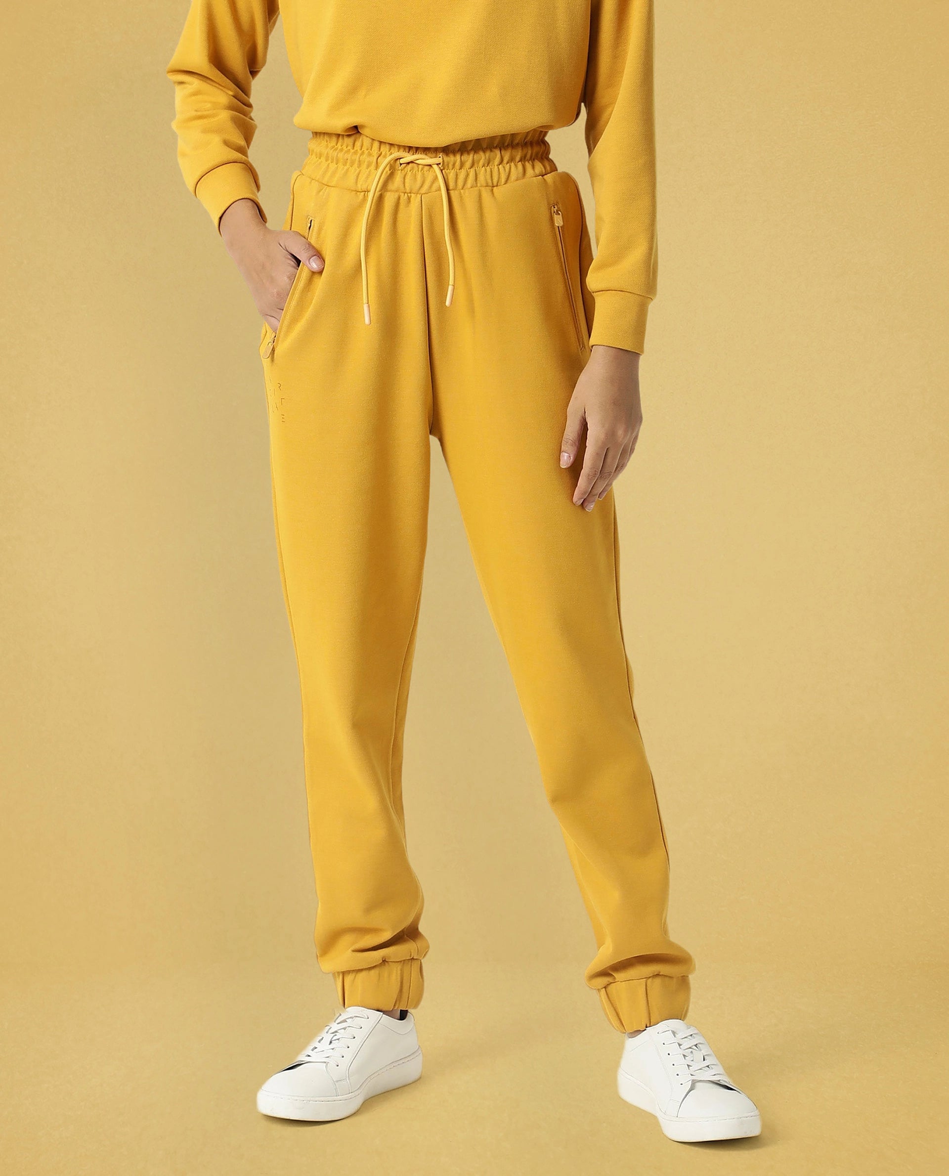 Rareism Women Creta Mustard Cotton Blend Fabric Relaxed Fit Solid Mid Rise Ankle Length Track Pant