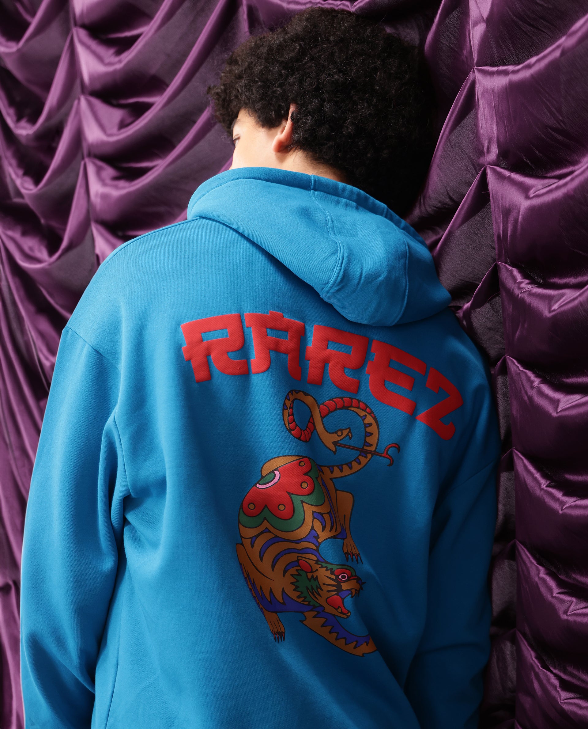 Rare Rabbit Men Dary Flouroscent Blue Cotton Polyester Fabric Full Sleeve Crew Neck Boxy Fit Puff Print Hooded Sweatshirt