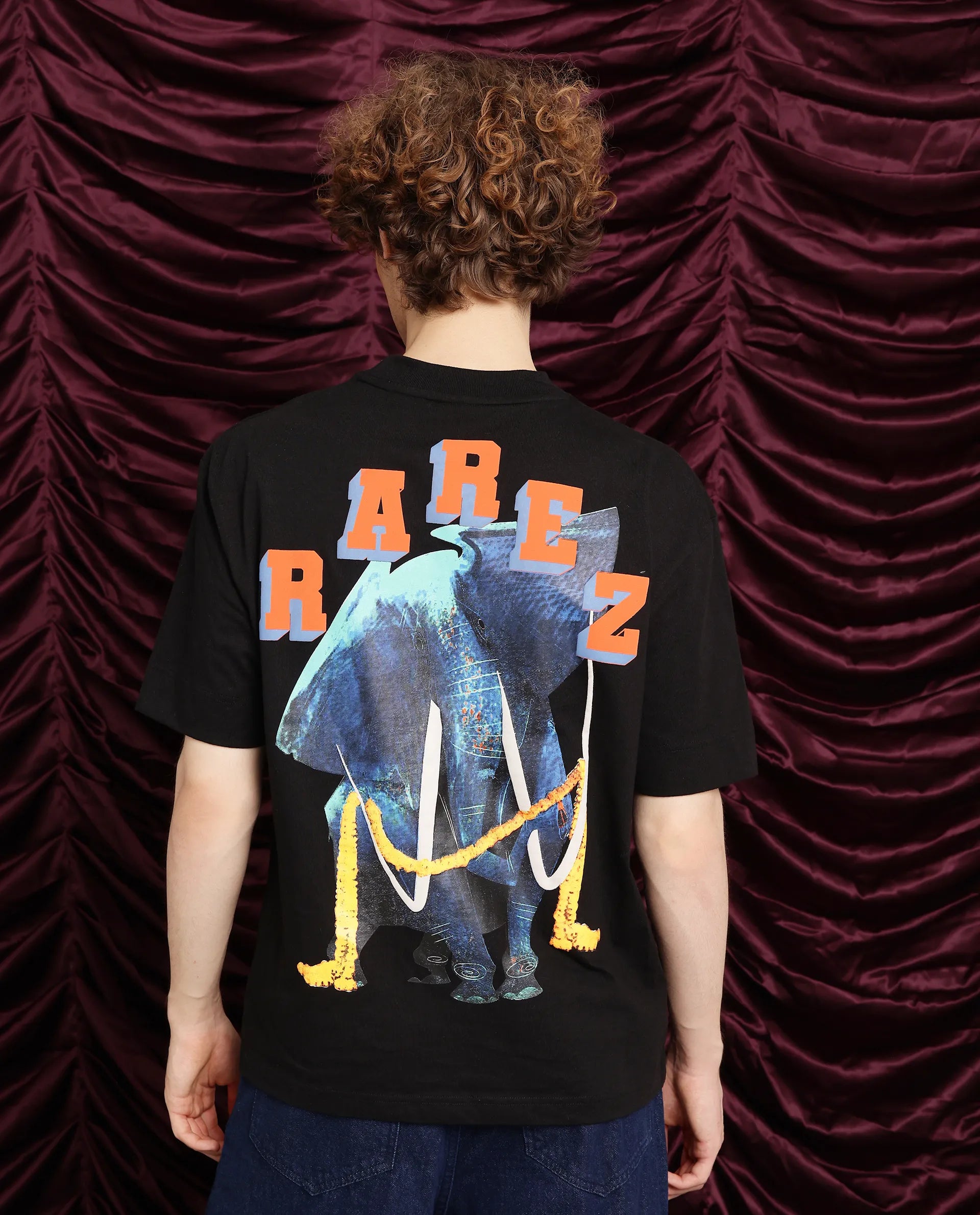 Rare Rabbit Men Elep Black Cotton Fabric Short Sleeve Crew Neck Oversized Fit Graphic Back Print T-Shirt