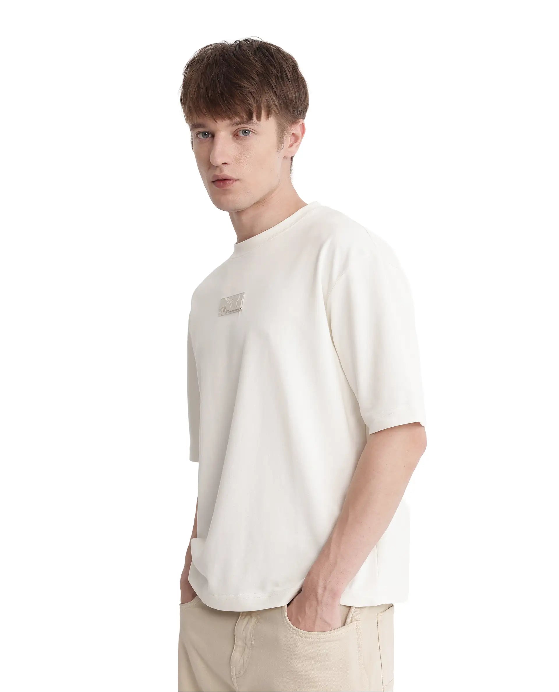 Rare Rabbit Men Endy Off White Cotton Poly Fabric Short Sleeve Boxy Fit Silicone Badge Branding T-Shirt