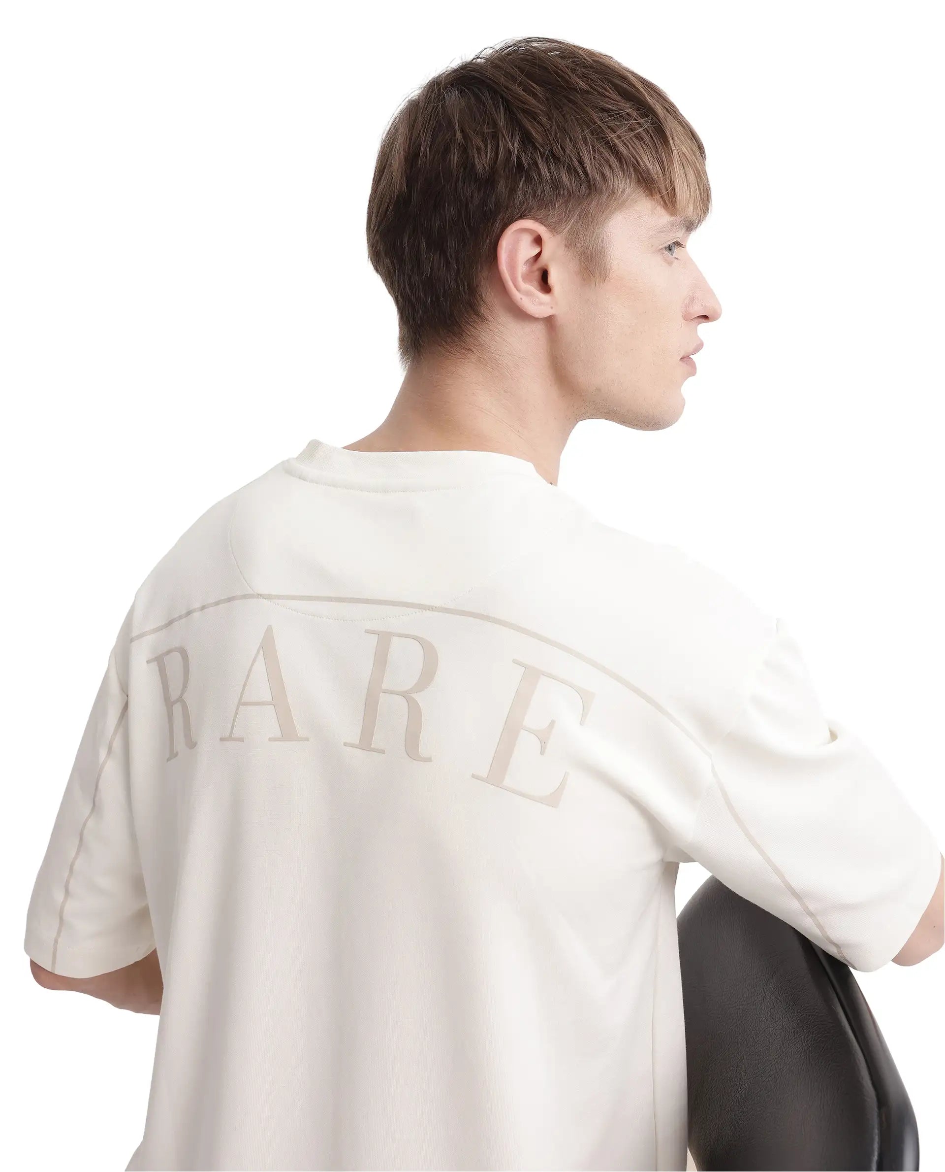 Rare Rabbit Men Endy Off White Cotton Poly Fabric Short Sleeve Boxy Fit Silicone Badge Branding T-Shirt