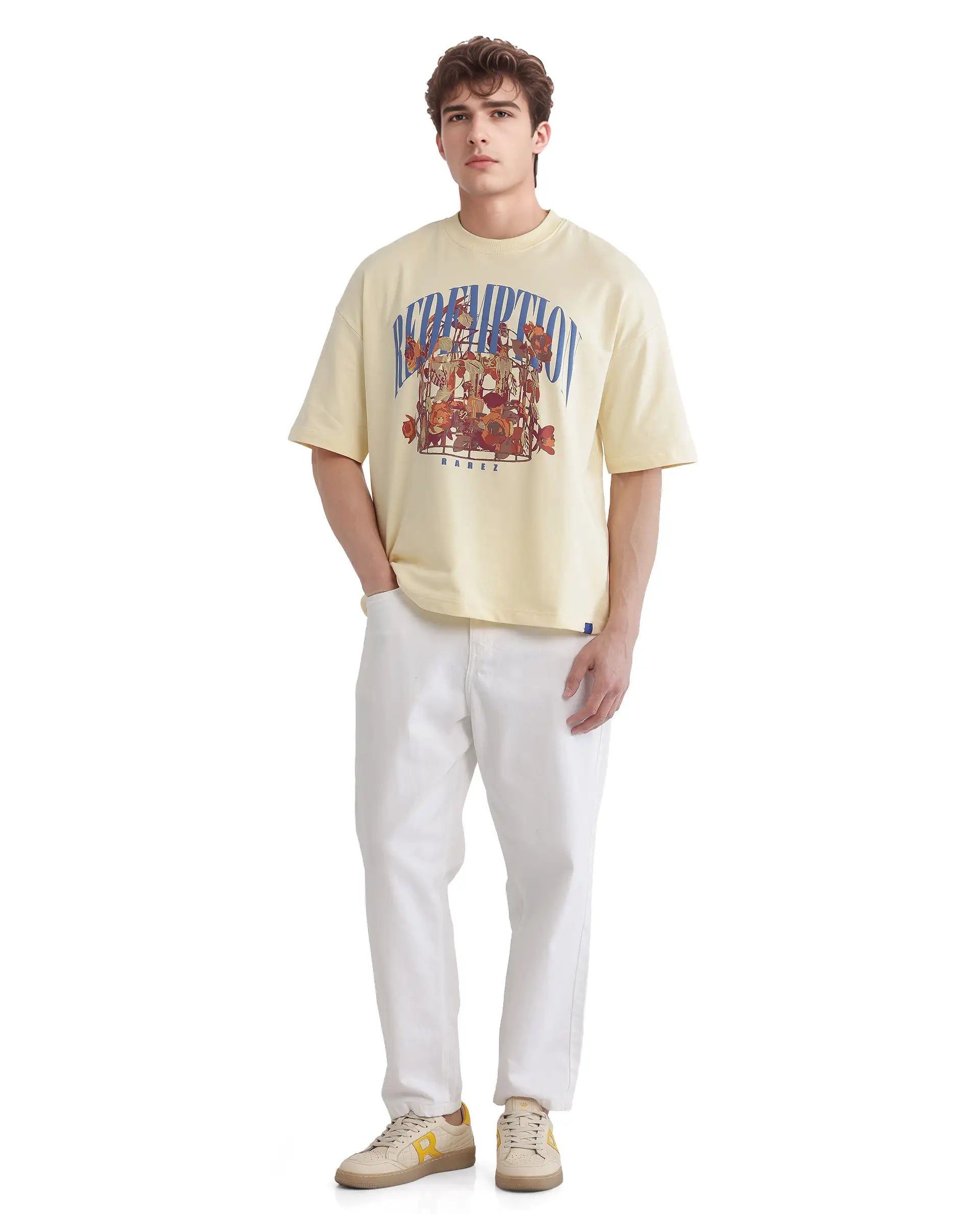 Rare Rabbit Men Fler Pastel Yellow Cotton Fabric Short Sleeve Crew Neck Oversized Fit Hd and Typography Print T-Shirt