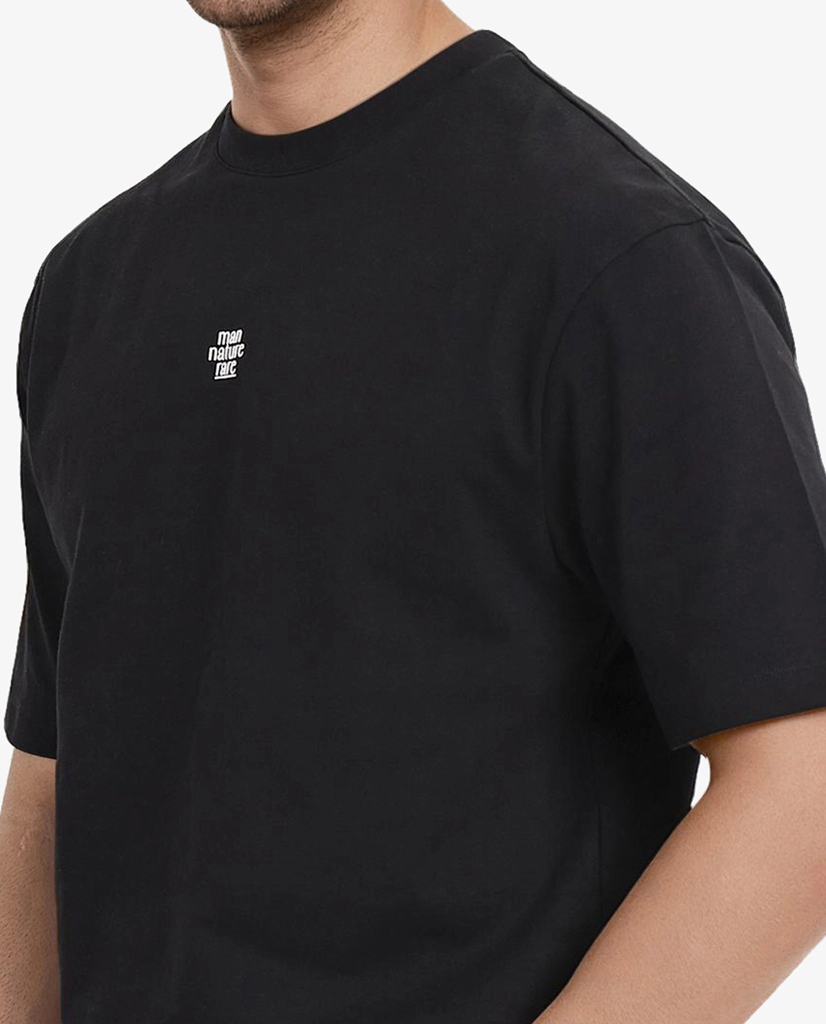 Rare Rabbit Men Fluers Black Cotton Fabric Short Sleeve Crew Neck Oversized Fit Graphic Back Print T-Shirt