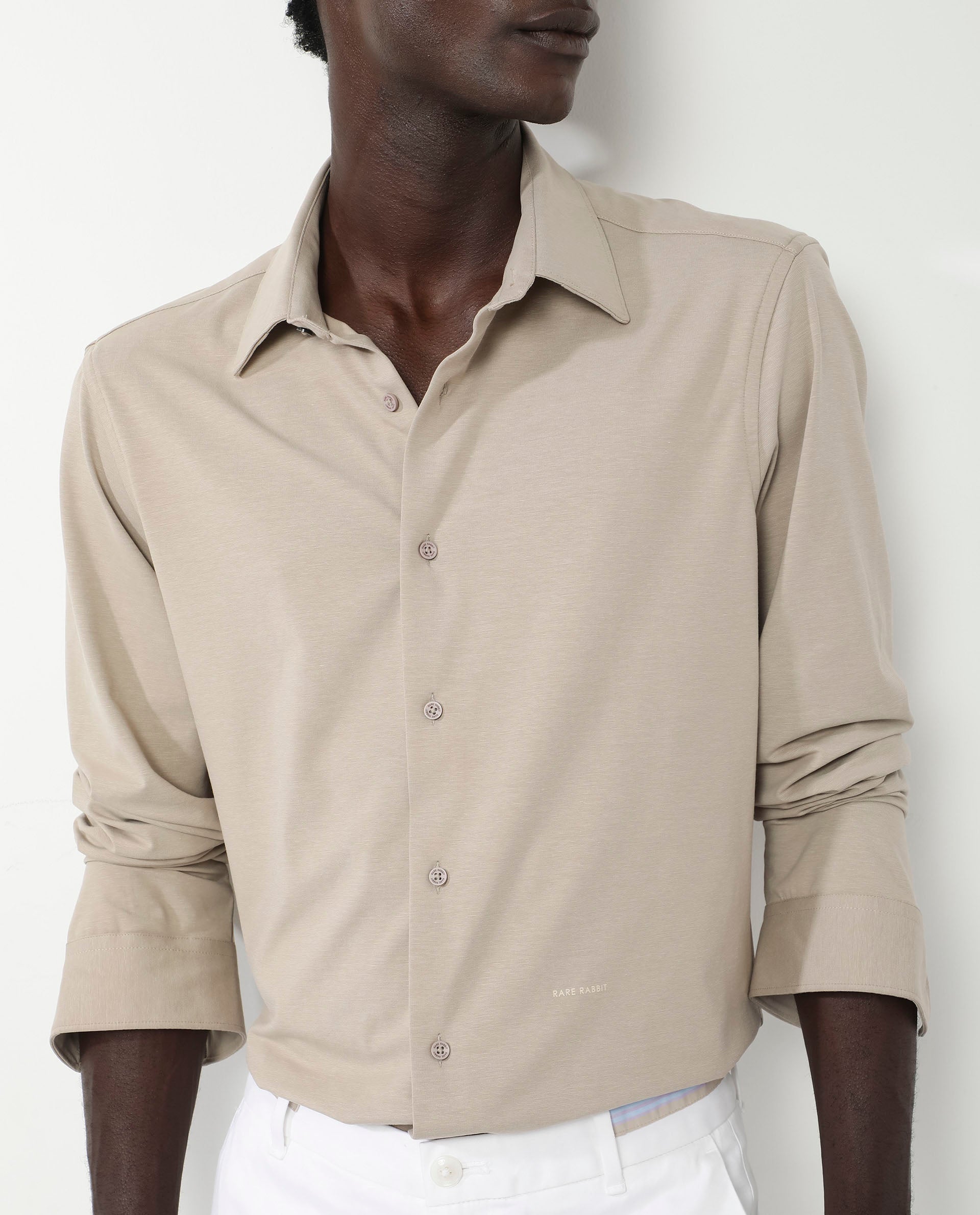 Rare Rabbit Men's Flyknit Beige Cotton Polyester Fabric Full Sleeves Knitted Solid Shirt