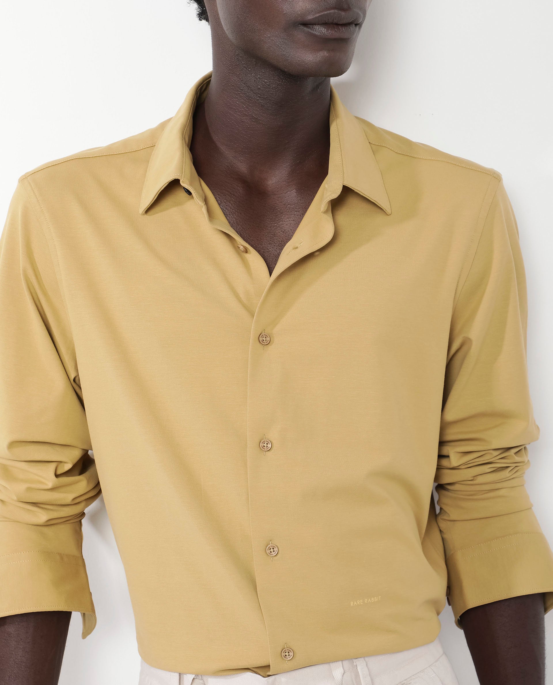 Rare Rabbit Men's Flyknit Mustard Cotton Polyester Fabric Full Sleeves Knitted Solid Shirt