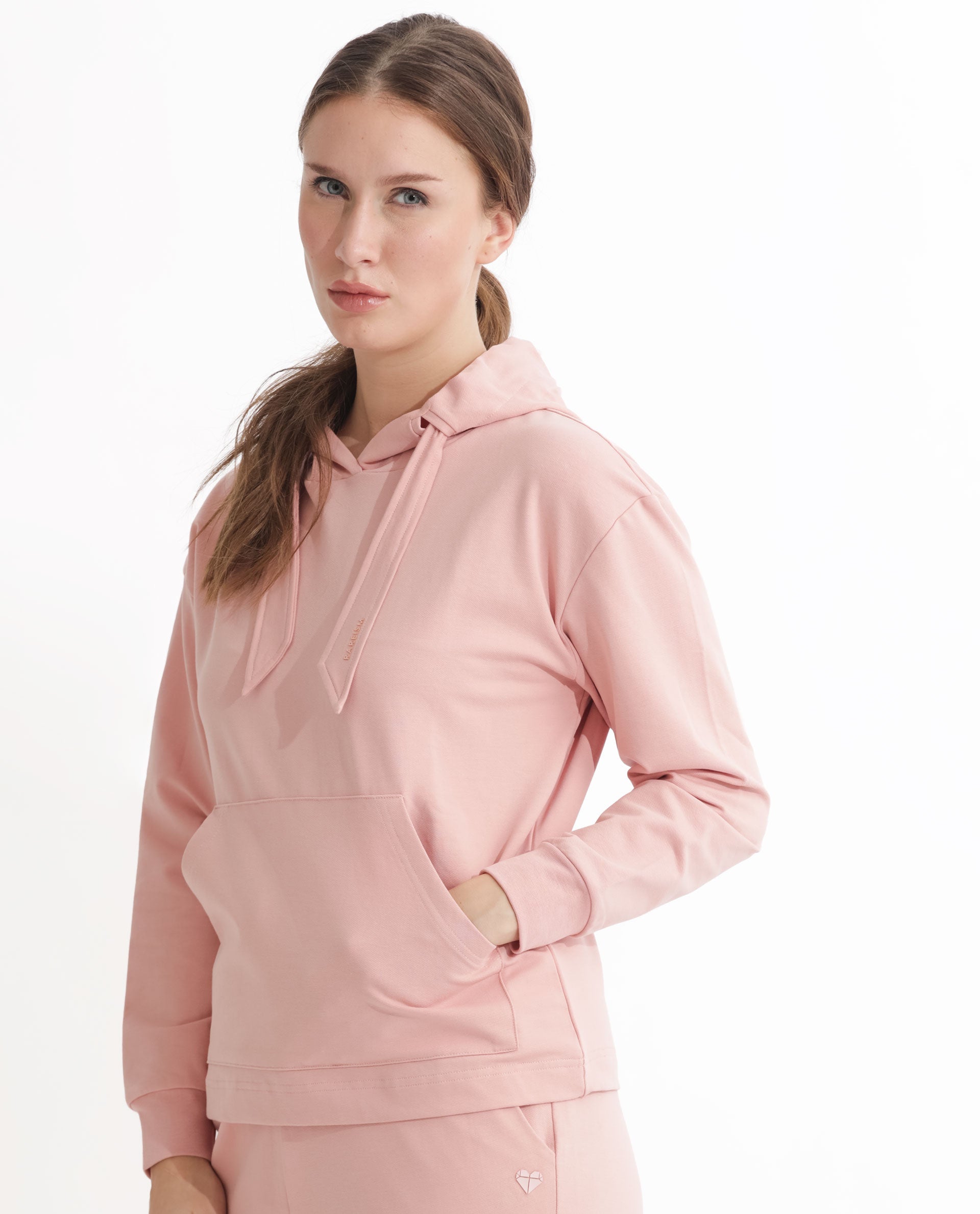 Rareism Women Flynn Light Orange Cotton Lycra Fabric Regular Fit Full Sleeves Solid Hooded Sweatshirt