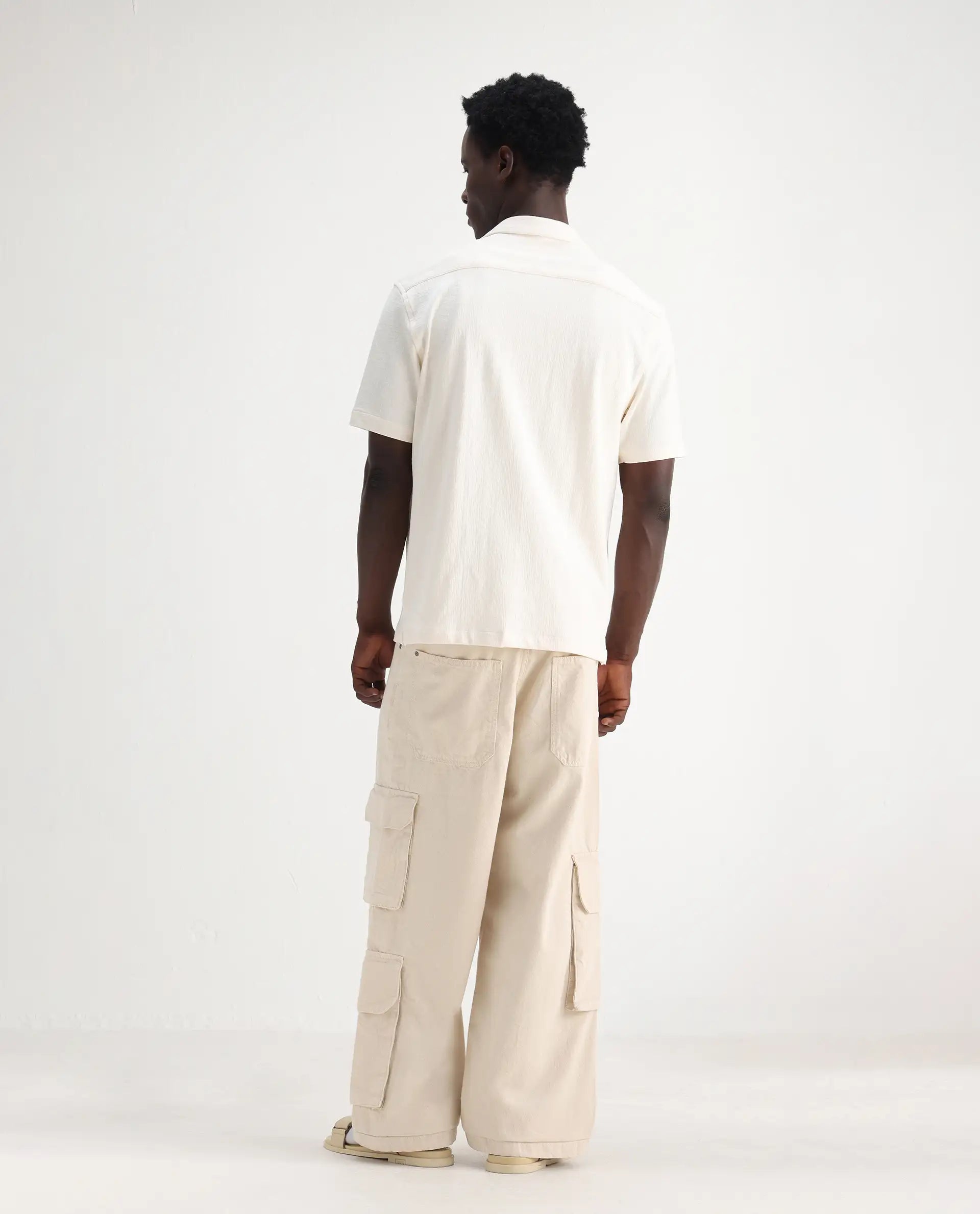 Rare Rabbit Men's Freks Beige Cotton Plain Baggy Fit Jeans